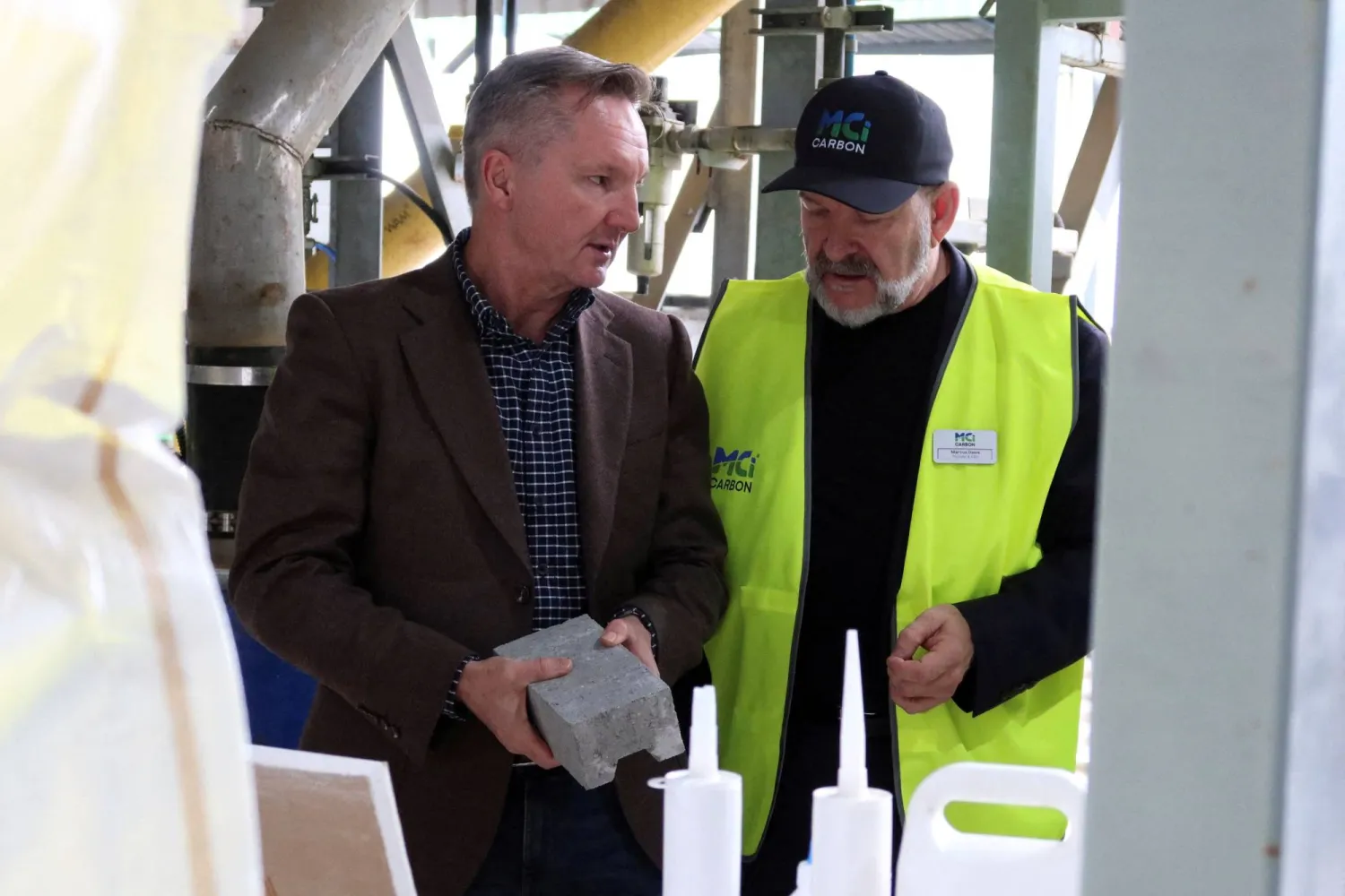 FILE PHOTO: Australian Energy Minister Chris Bowen and MCi Carbon's CEO Marcus Dawe at the carbon refinery facility in Newcastle, Australia, June 17, 2026. REUTERS/Cordelia Hsu/File Photo