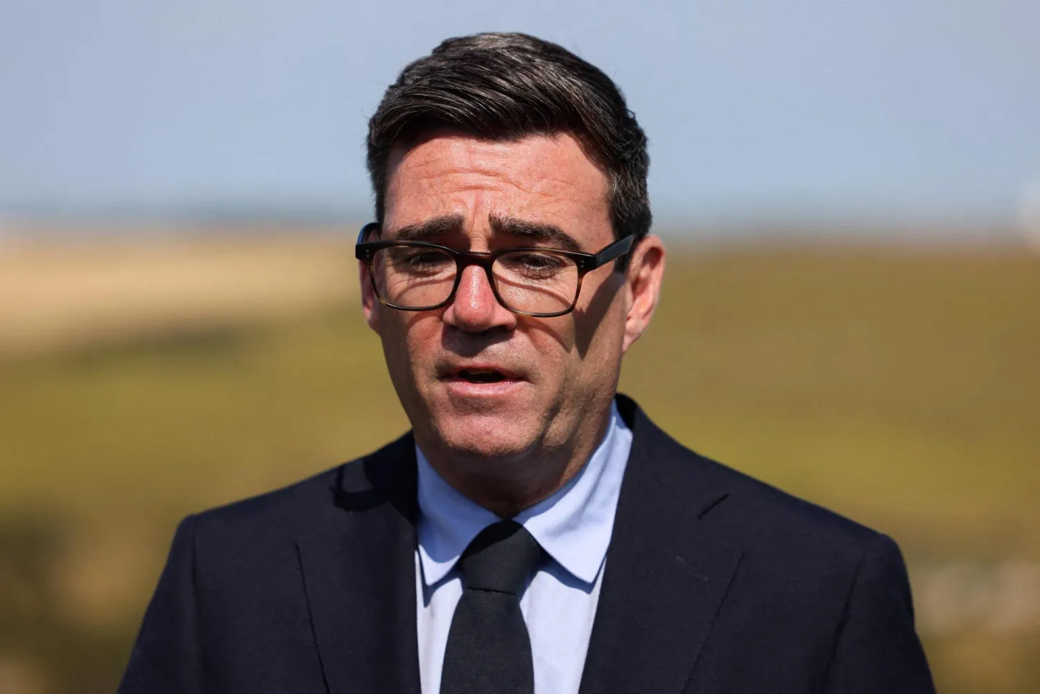 Britain's Prime Minister Andy Burnham speaks to members of the media during a visit to HM Coastguard Maritime Rescue Coordination Centre, in Dover, southern England, on August 2, 2026. (AFP)