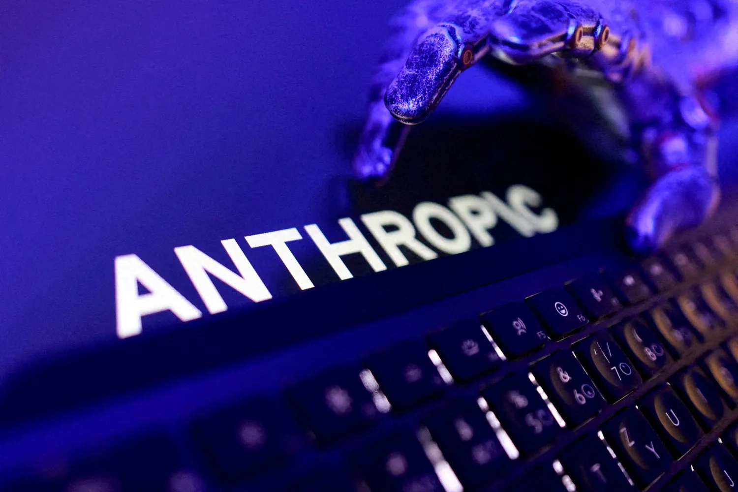 The Anthropic logo, a keyboard and a robotic hand in this illustration created on June 5, 2026. (Reuters)