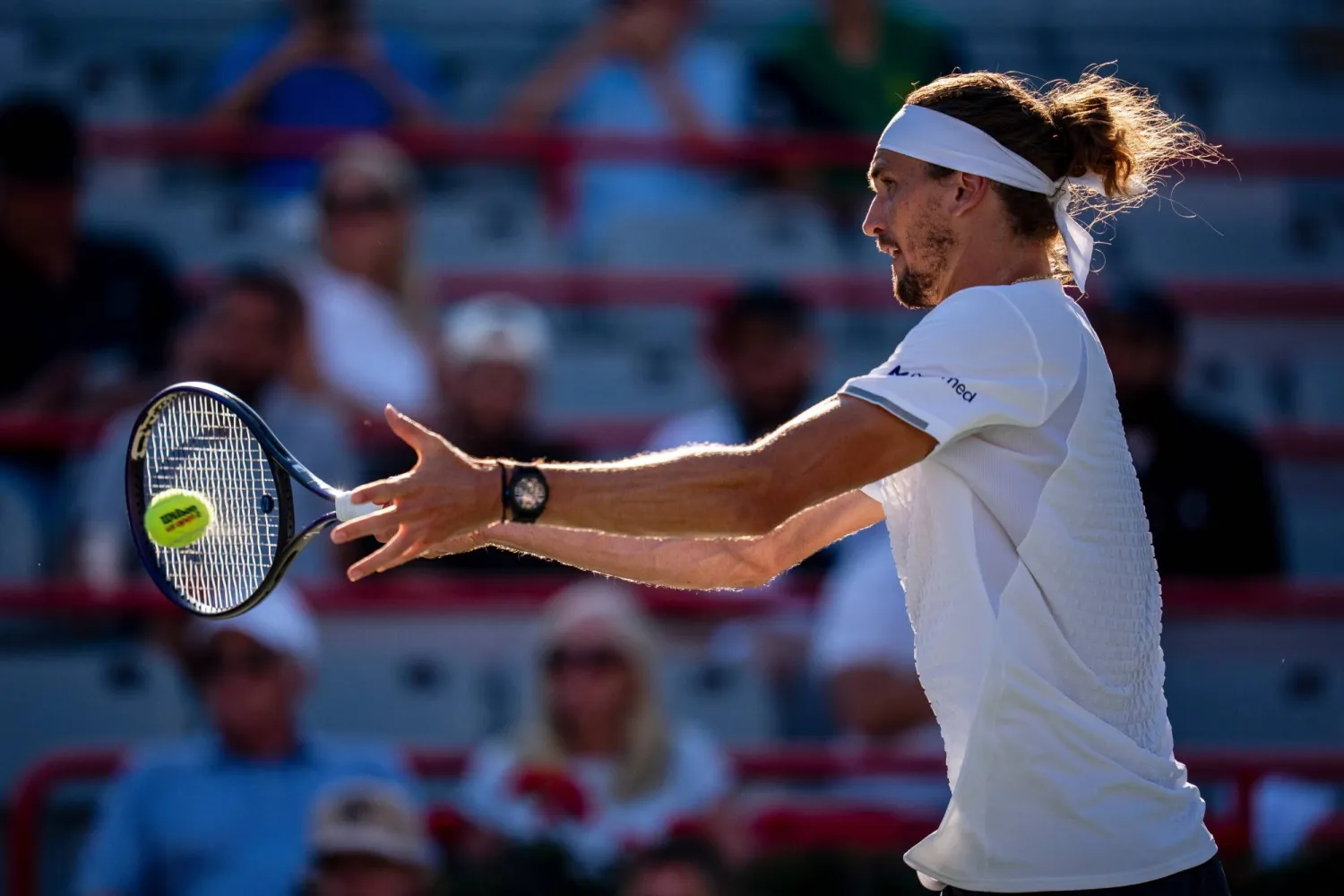 Alexander Zverev of Germany returns the ball from Tallon Griekspoor of Netherlands on day four of the National Bank Open tennis tournament in Montreal on Wednesday, Aug. 5, 2026. (Graham Hughes/The Canadian Press via AP)