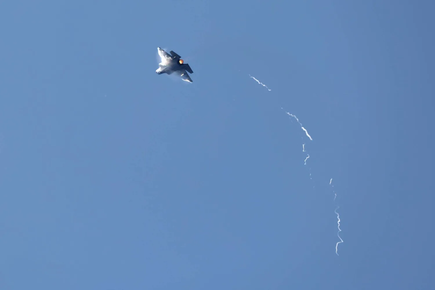 A Lockheed Martin F-35 Lightning II is flown as part of a display on the opening day of the Farnborough International Airshow 2026 in in Farnborough, south-west of London, on July 20, 2026. (Photo by Toby Shepheard / AFP)