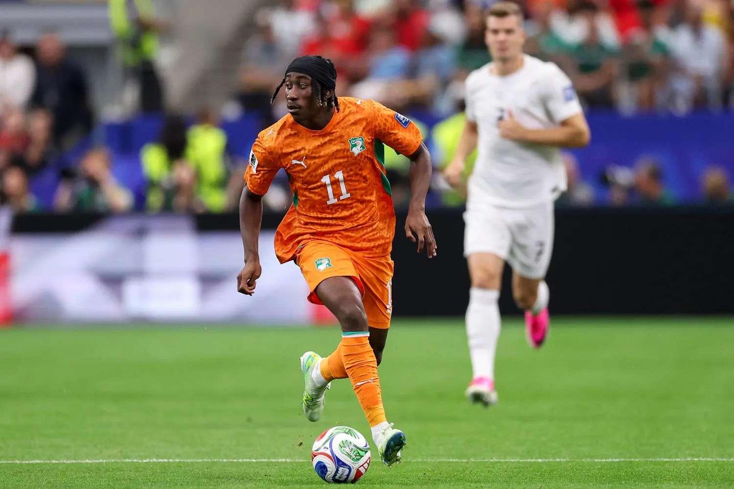 FILE - Ivory Coast's Yan Diomande (11) moves the ball during the World Cup round of 32 soccer match between Ivory Coast and Norway in Arlington, Texas, June 30, 2026. (AP Photo/Sam Hodde, File)