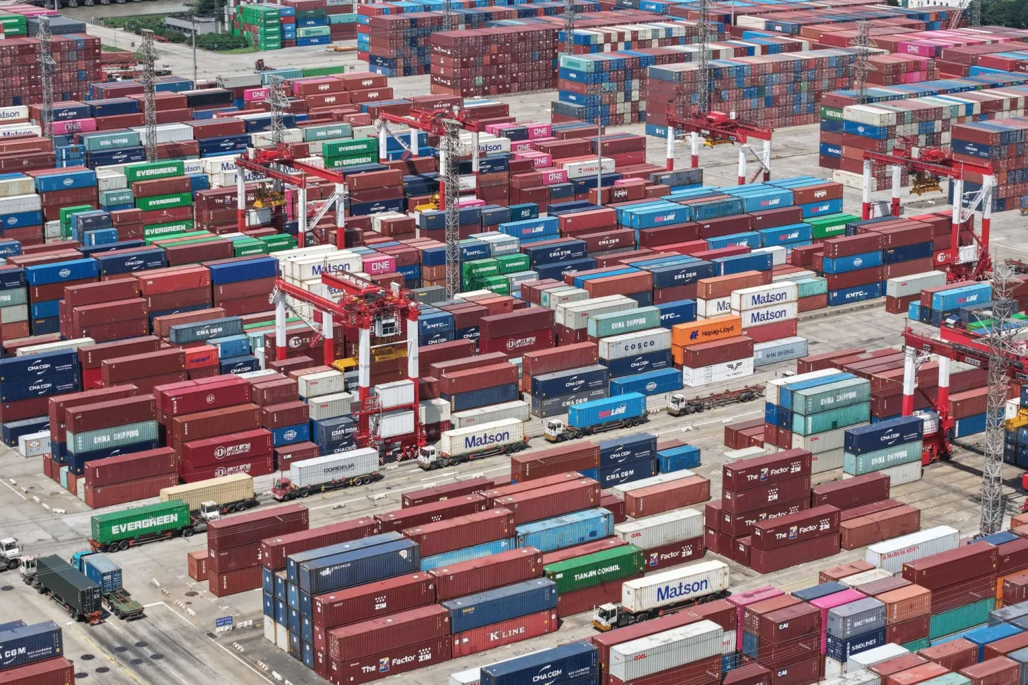 Containers are seen at the port in Shanghai on July 14, 2026. (Photo by CN-STR / AFP)