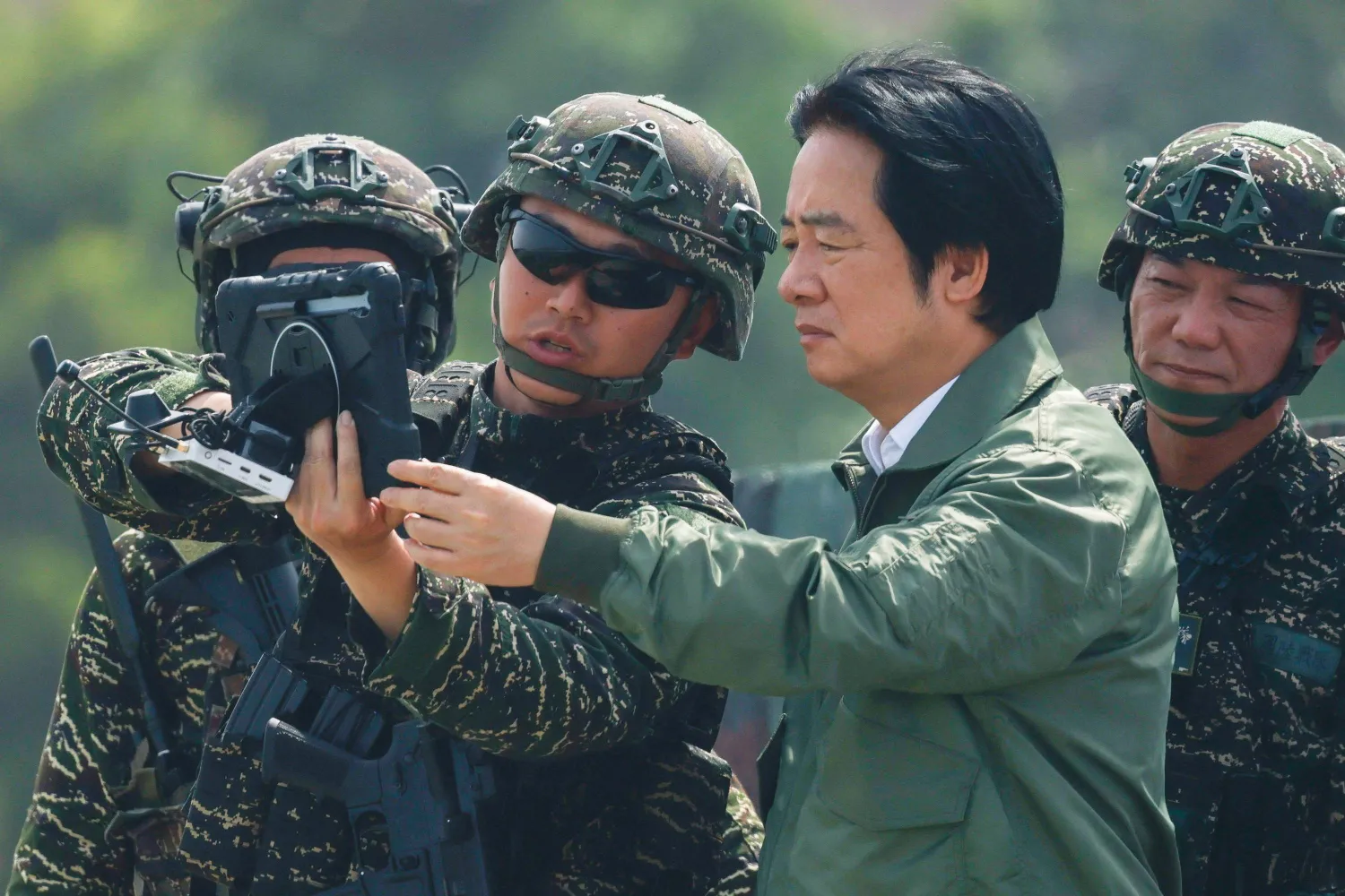  Taiwanese President Lai Ching-te attends a drone demonstration during the annual Han Kuang military exercises at a navy base in Kaohsiung, Taiwan, August 8, 2026. (Reuters)