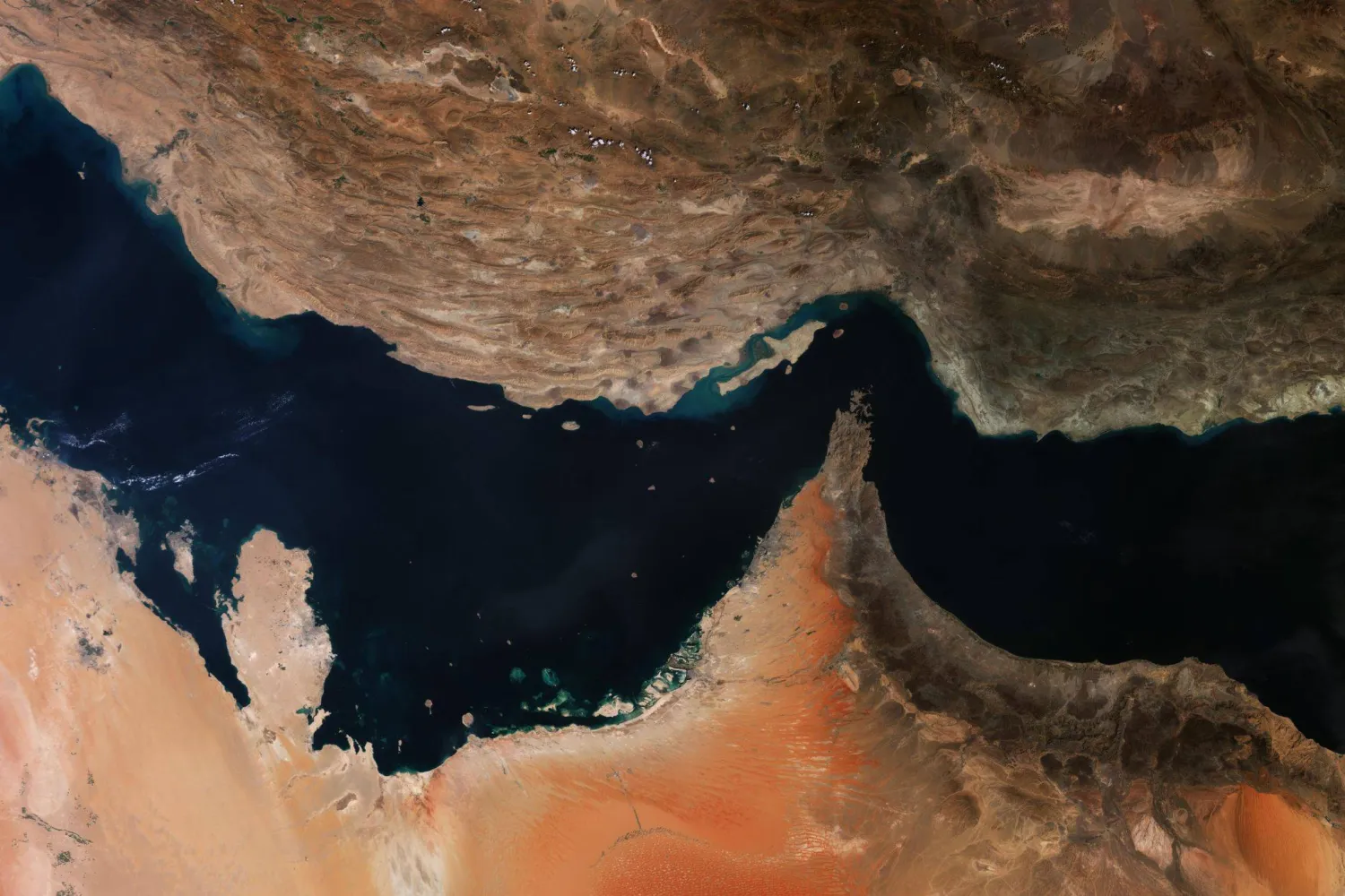 FILED - 08 October 2018, ---: FILE PHOTO - A satellite image captured by Copernicus Sentinel-3A and provided by ESA shows the Strait of Hormuz, which connects the Gulf of Oman with the Arabian Gulf and separates Iran from the countries of the Arabian Peninsula. Photo: -/ESA/dpa 