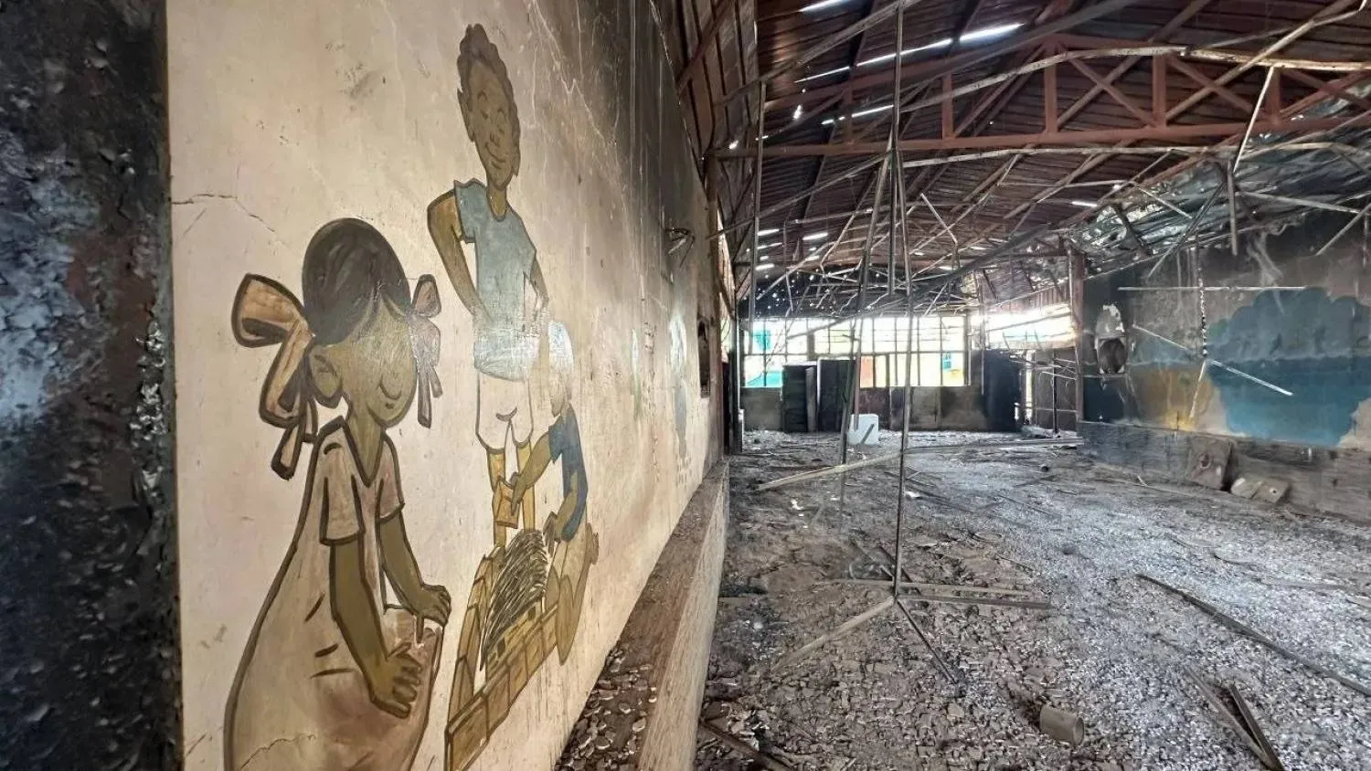 Signs of destruction and fire damage inside a residential care facility for children without parental care (Asharq Al-Awsat) 