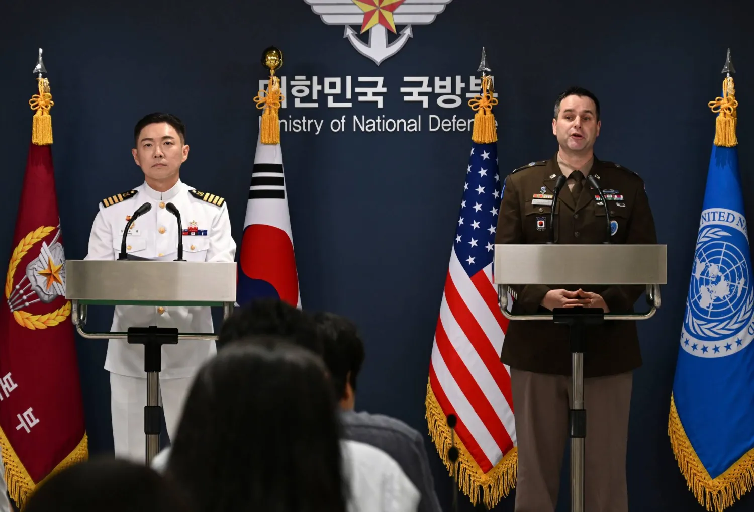 Col. Jang Do-young, left, public affairs director of South Korea's Joint Chiefs of Staff and Col. Ryan Donaldn, public affairs director of the United Nations Command, Combined Forces Command and United States Forces Korea attend a press briefing for the Ulchi Freedom Shield 2026 exercise at the Defense Ministry in Seoul, South Korea Monday, Aug. 10, 2026. (AP) 