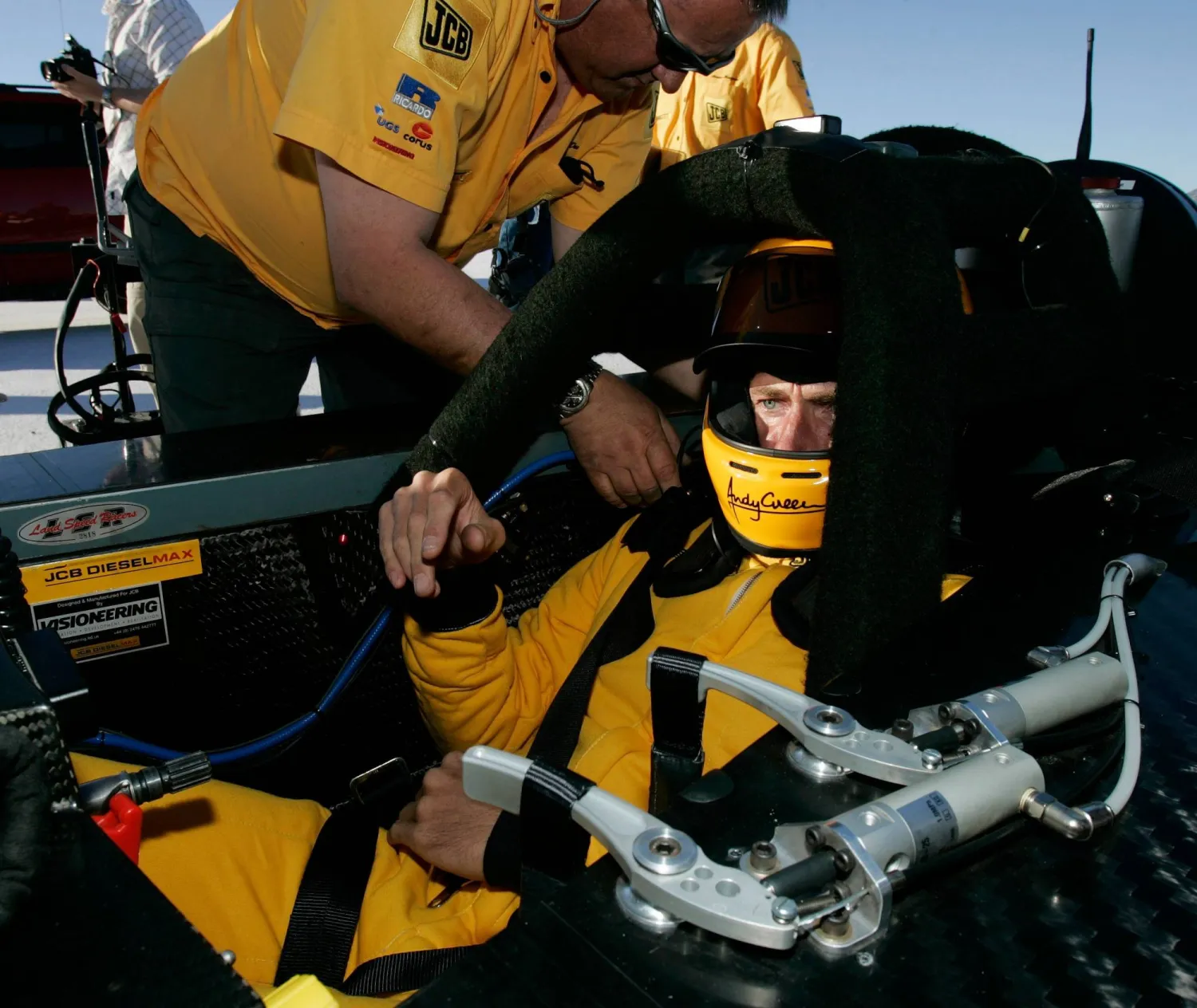 FILE - British driver Andy Green gets strapped into his seat before setting a new unofficial world diesel powered land speed record of over 328 mph over two runs Tuesday, Aug. 22, 2006, on the Bonneville Salt Flats of Utah. (AP Photo/Douglas C. Pizac,File)