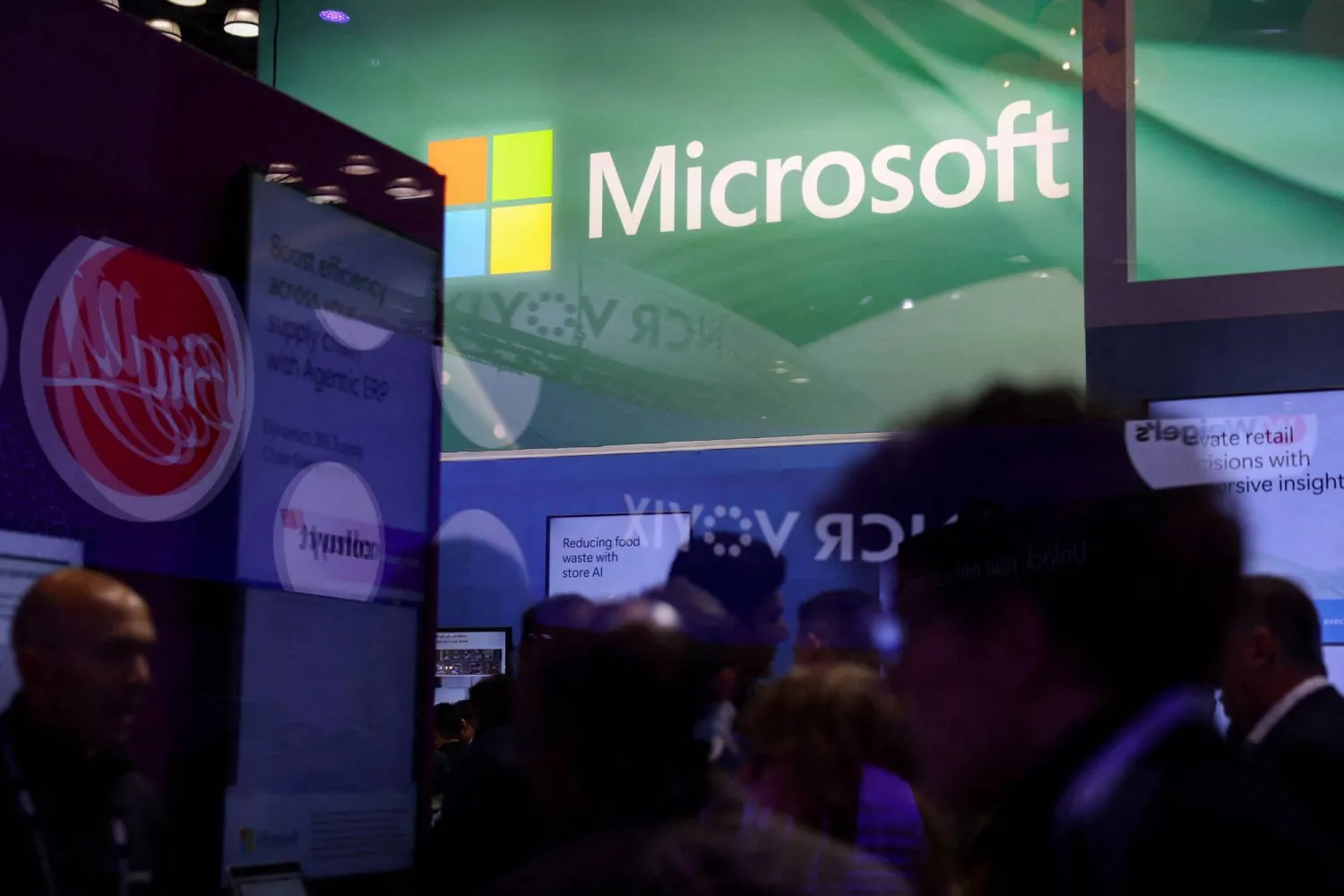 A Microsoft sign seen through glass during the 2026 National Retail Federation (NRF) conference in New York (Reuters)