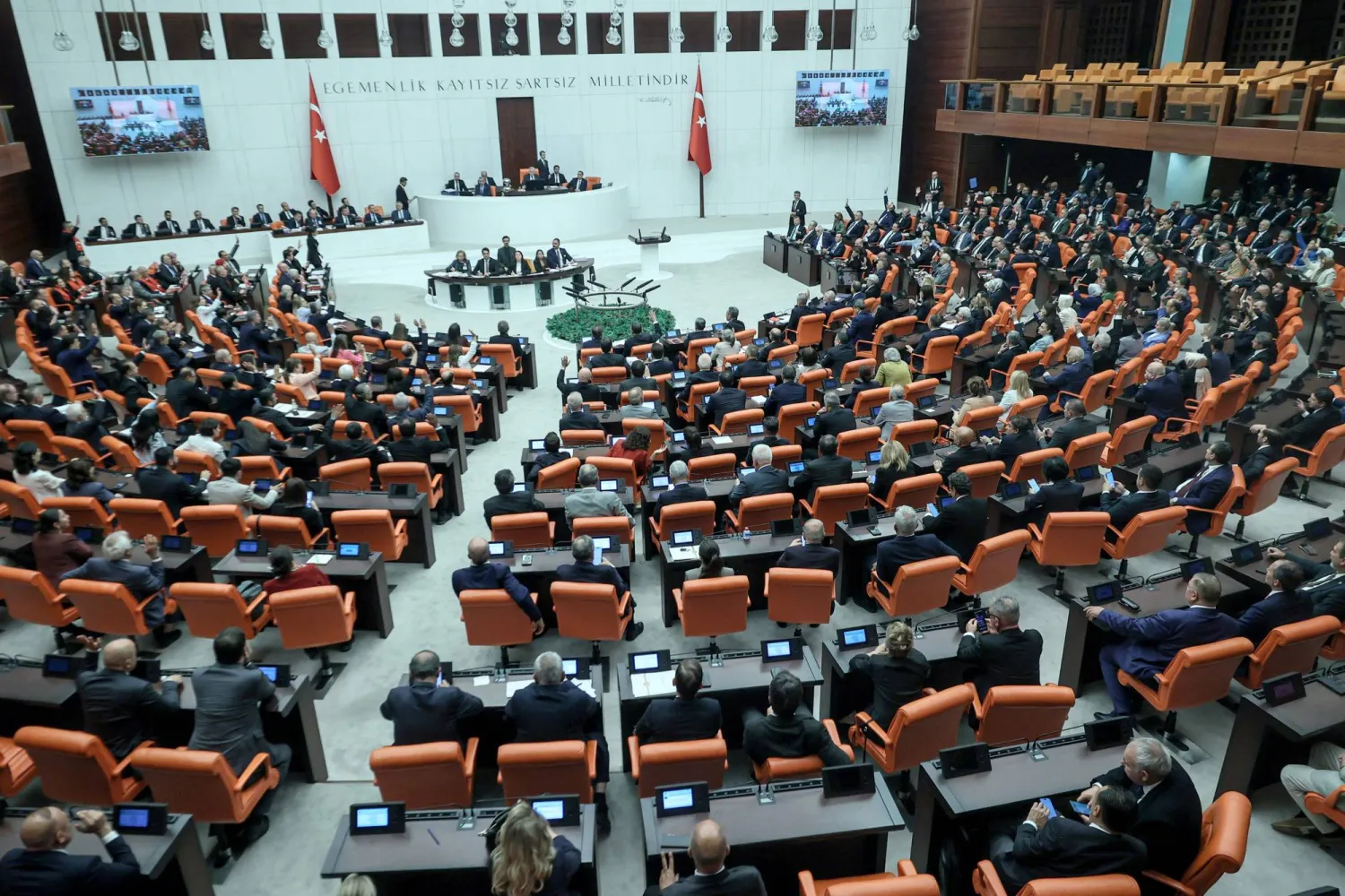 Lawmakers take part in a voting session on a bill offering limited amnesty for Kurdish PKK militants at Grand National Assembly of Türkiye in Ankara on August 10, 2026. (AFP)