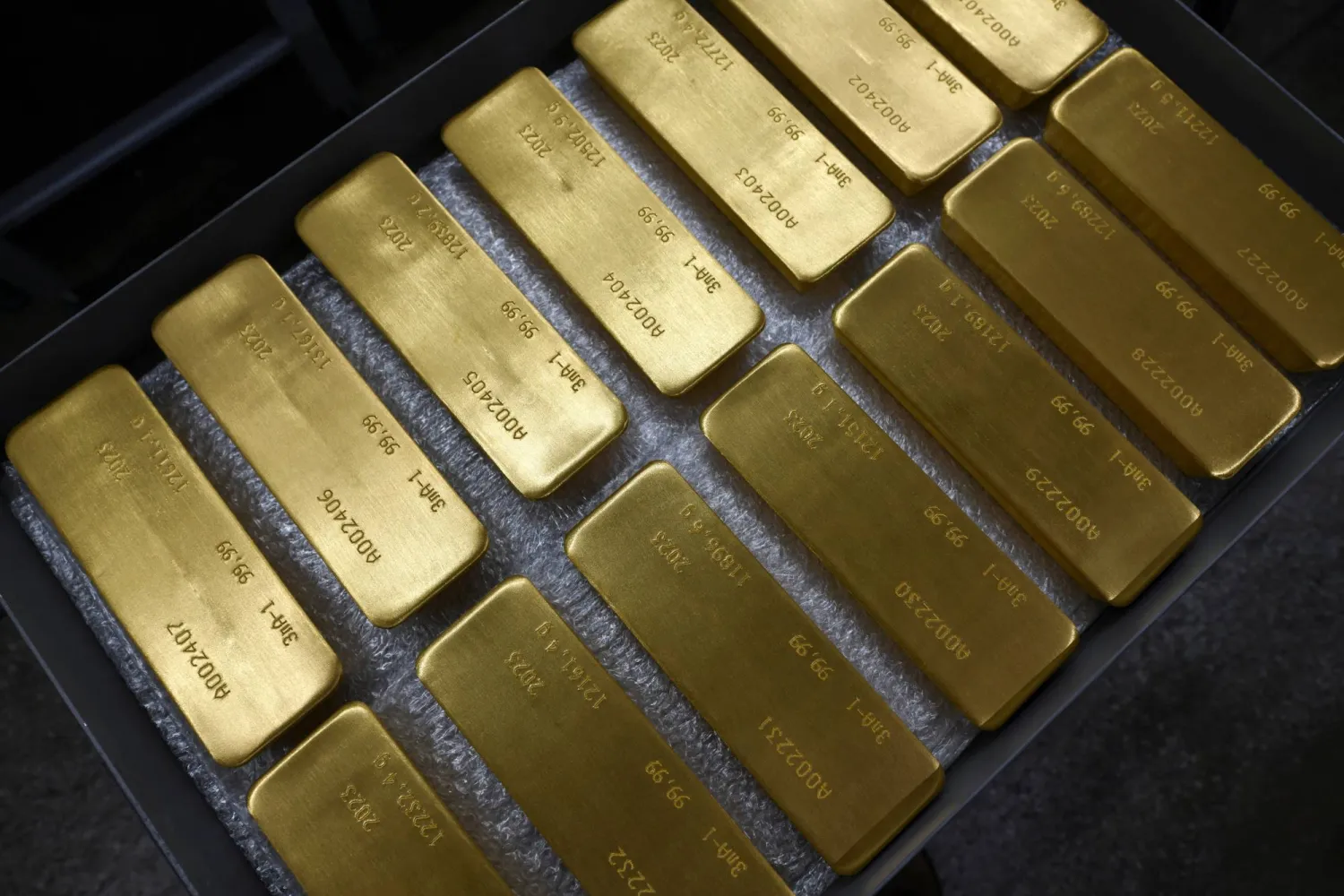 Ingots of 99.99 percent pure gold are placed in a workroom at Krastsvetmet precious metals plant in the Siberian city of Krasnoyarsk, Russia, January 31, 2023. (Reuters)