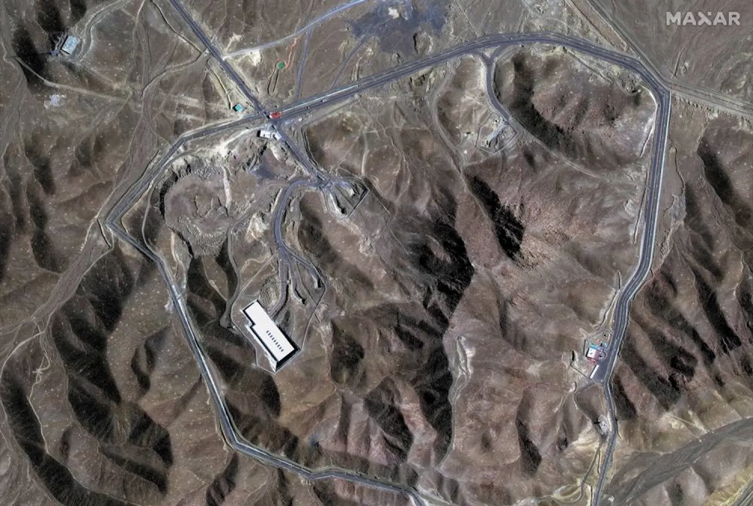 A satellite view shows an overview of Fordow underground complex, before the US struck the underground nuclear facility, near Qom, Iran June 20, 2025. (MAXAR TECHNOLOGIES/Handout via Reuters)