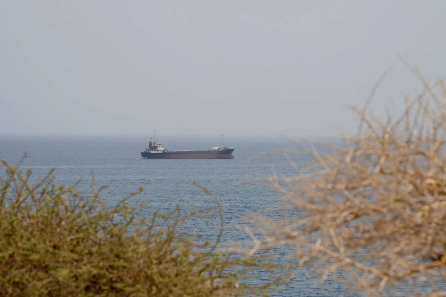 A vessel near the Strait of Hormuz, as seen from Musandam, Oman, August 10, 2026. (Reuters)