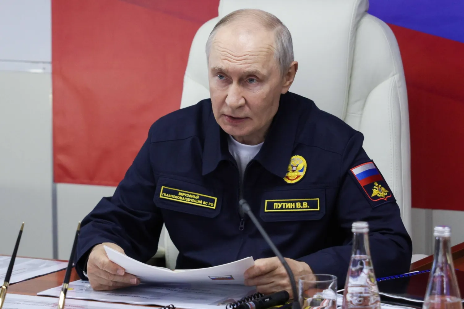 Russian President Vladimir Putin holds a meeting aboard the Guards missile cruiser Varyag during the final stage of the Pacific Fleet's exercises off the coast of Sakhalin region, Russia, 12 August 2026. (EPA/Gavriil Grigorov Kremlin / Pool)