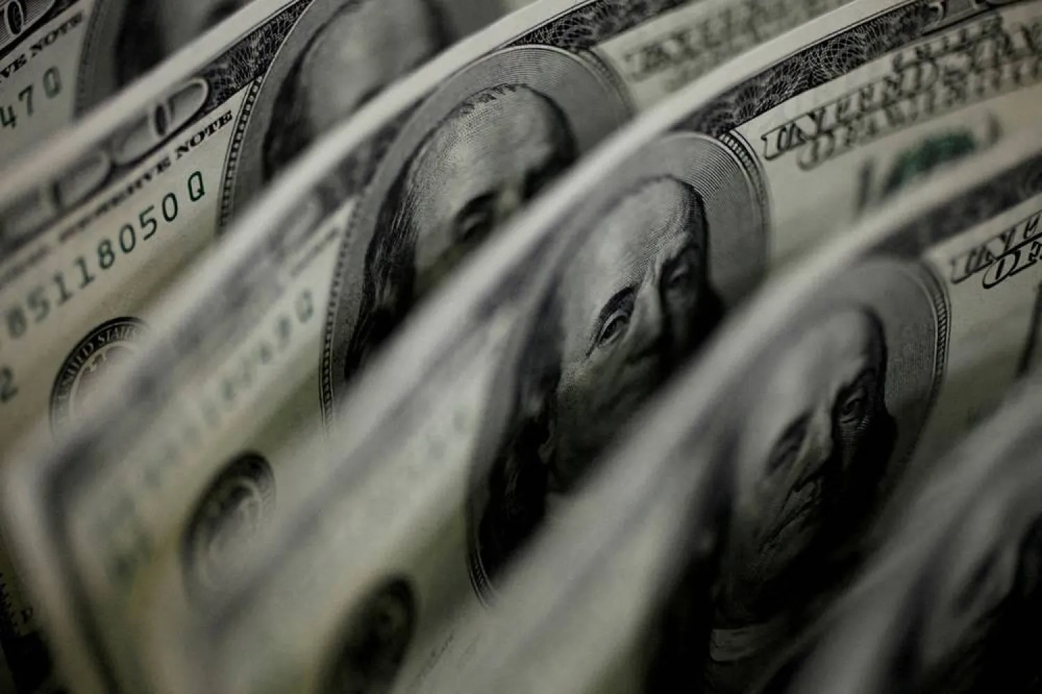 A picture illustration shows US 100 dollar bank notes taken in Tokyo August 2, 2011. (Reuters)