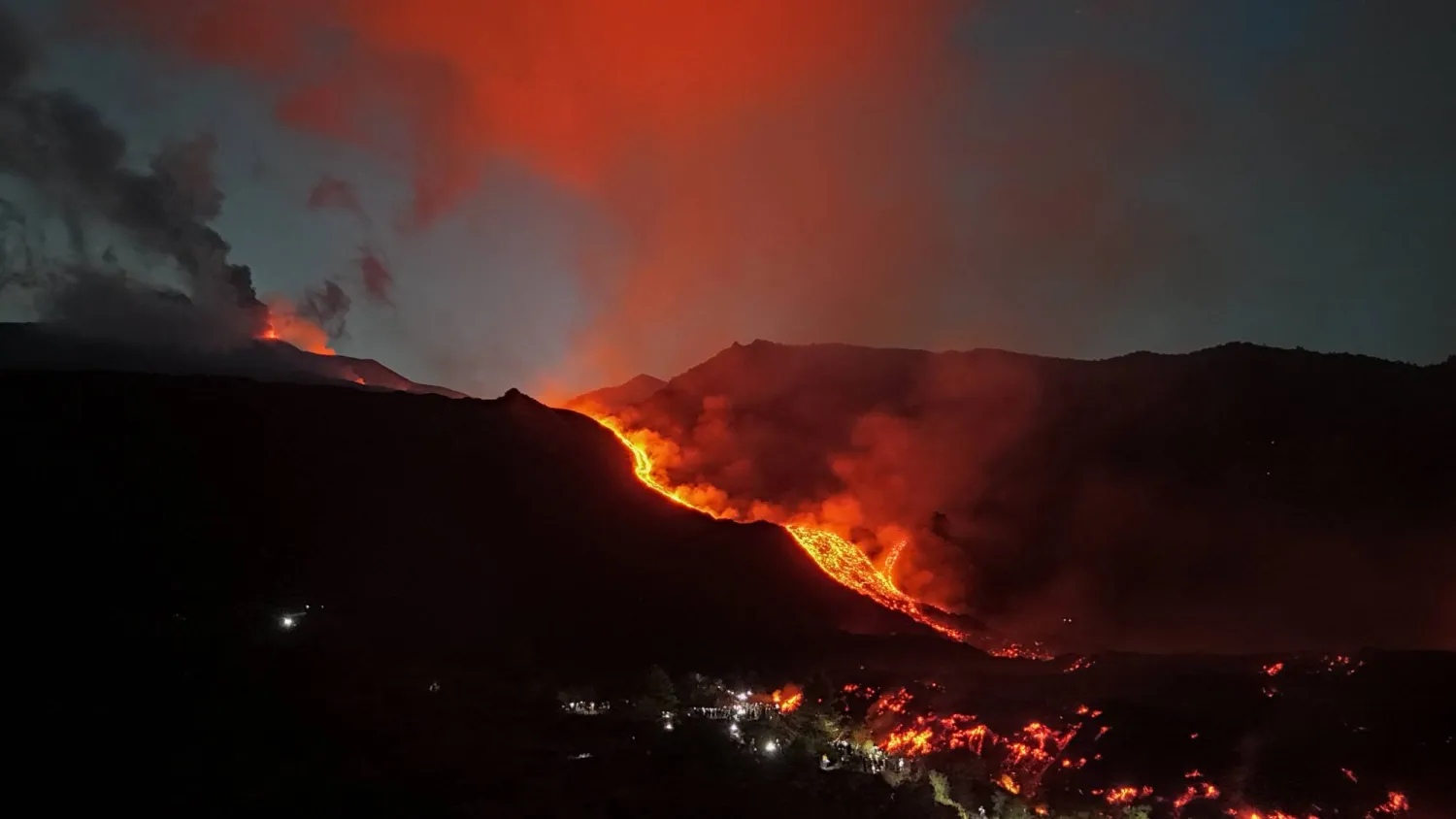  A drone view of volcanic ash and lava during an eruption at Mount Etna, forcing authorities to suspend flights at Catania airport, in Sicily, Italy, August 12, 2026. (Reuters)