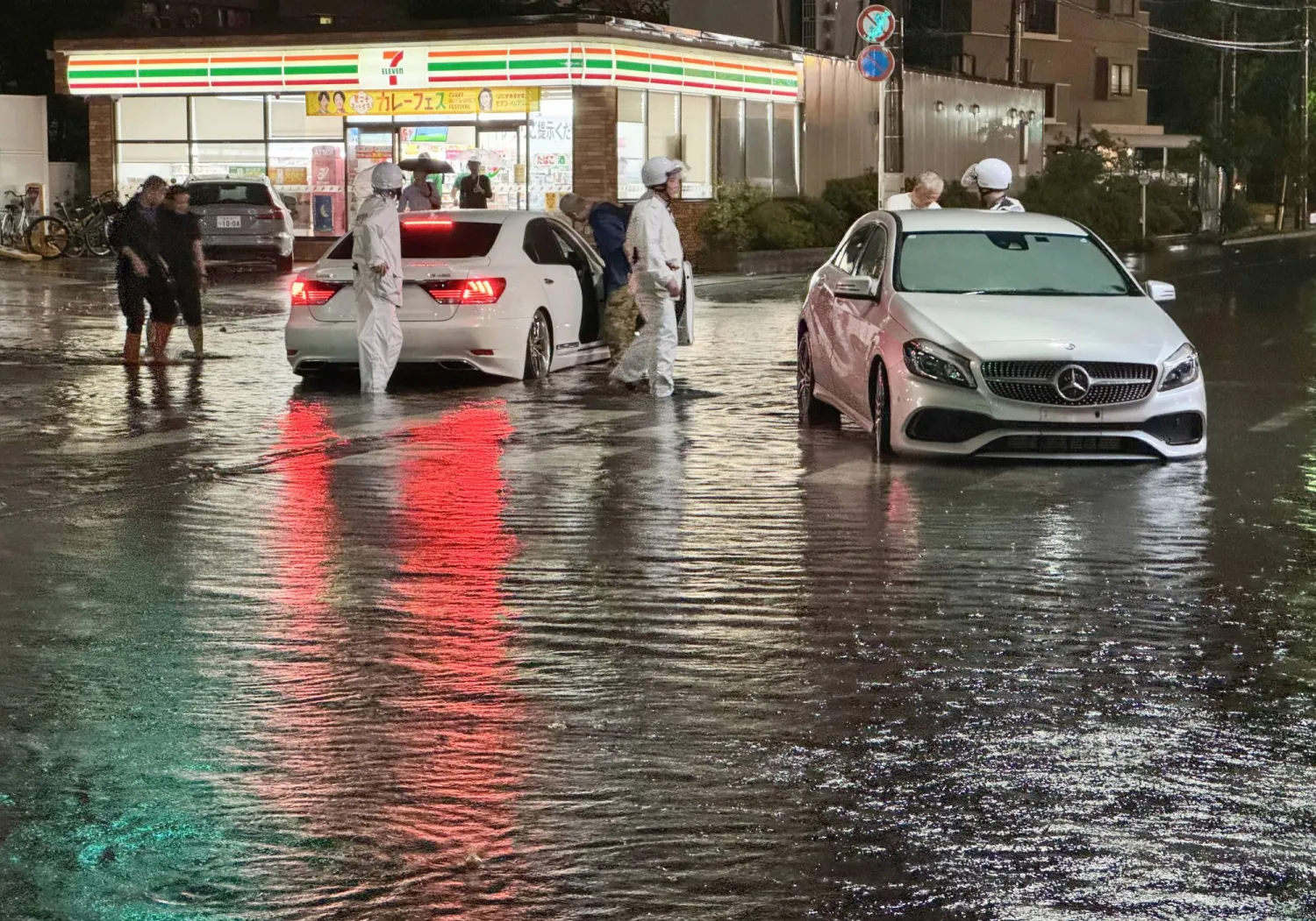 A view of a flooded road following heavy rain in Ichikawa, Chiba prefecture, near Tokyo, Japan, late 13 August 2026 (issued 14 August 2026). EPA/JIJI PRESS