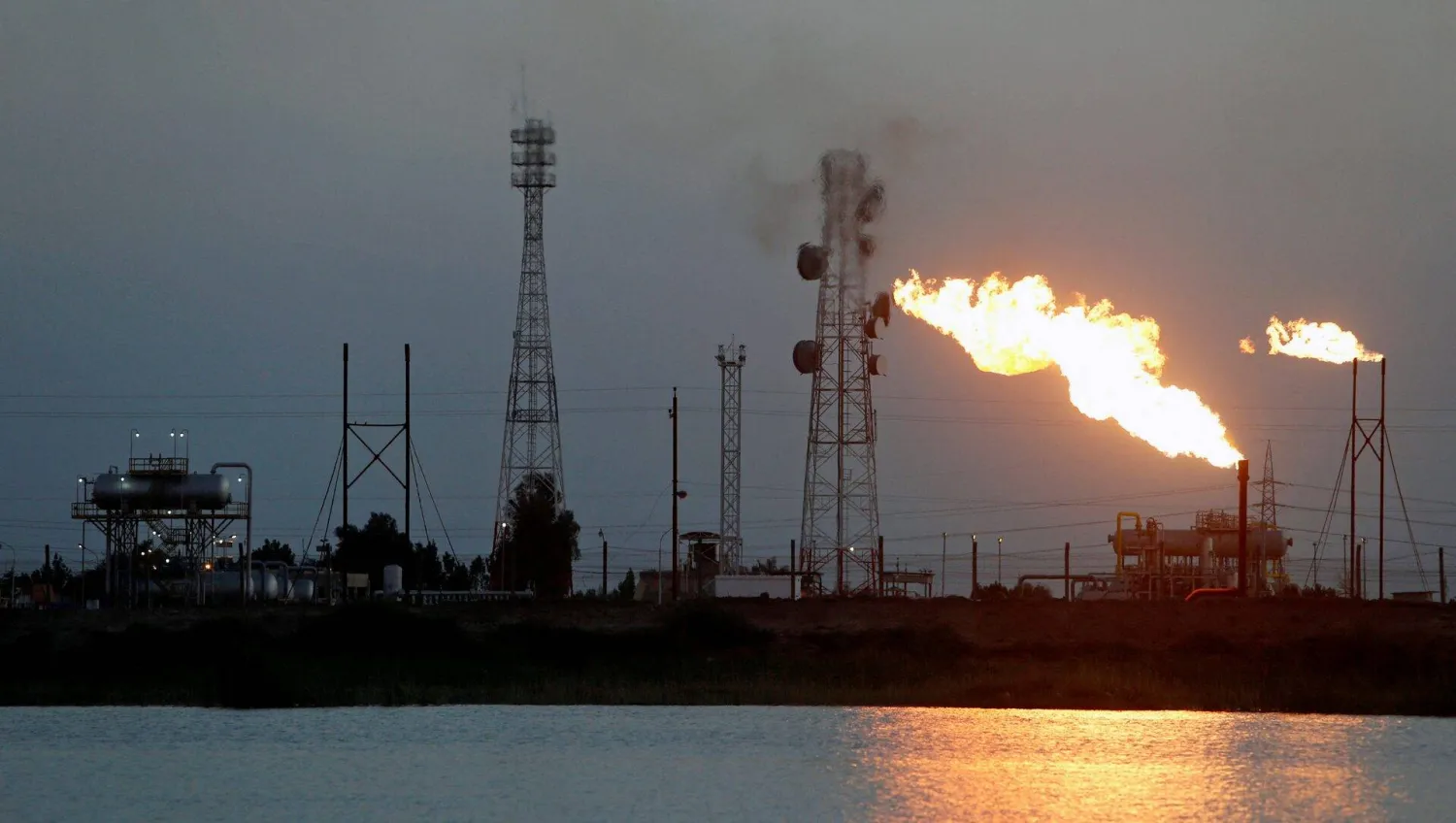 A view across Shatt al-Arab of the 'Bin Omar' oil field north of Basra, Iraq (Reuters)