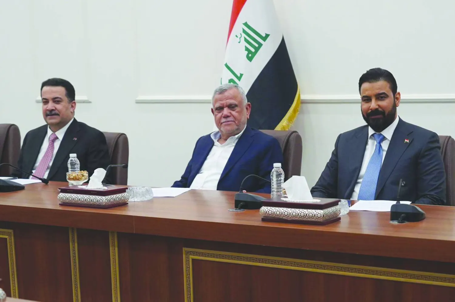 رئيس الحكومة علي الزيدي وعضو «التنسيقي» هادي العامري ورئيس تحالف «التنمية» محمد شياع السوداني (الإطار التنسيقي)