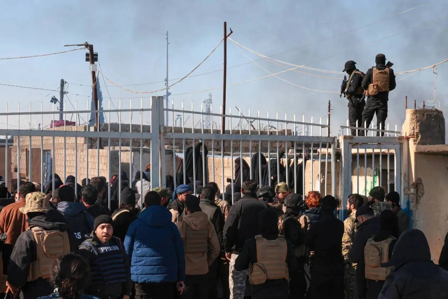 Syrian security forces at the entrance to al-Hol camp before its evacuation. (EPA file photo)