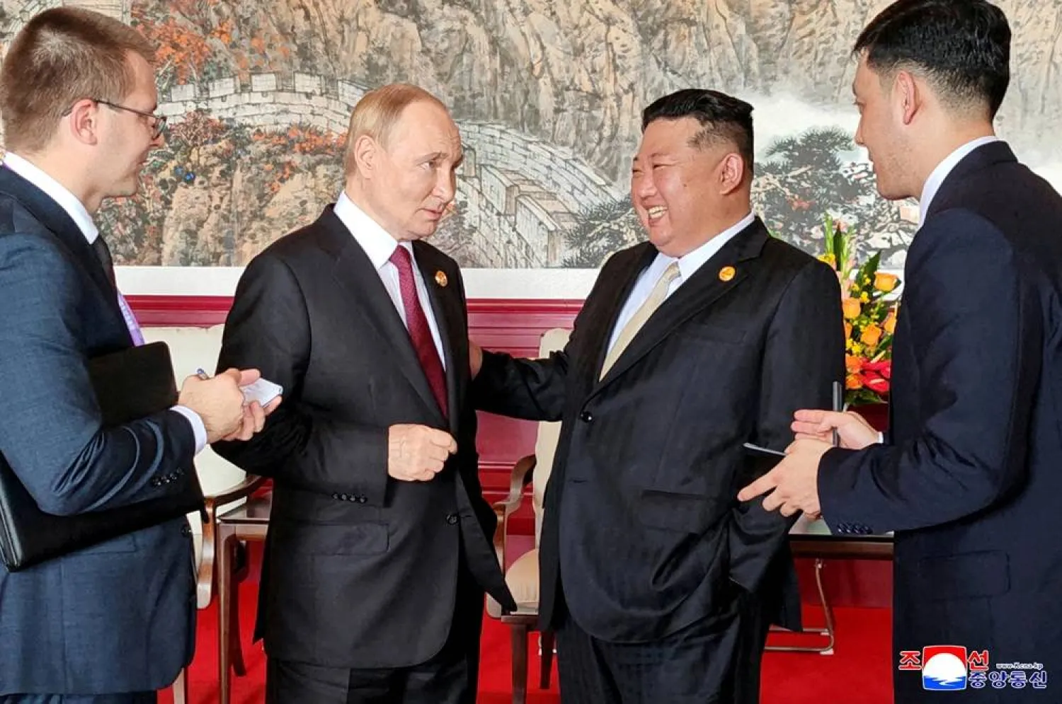 North Korean leader Kim Jong Un speaks with Russian President Vladimir Putin during their visit to Beijing to attend China's commemoration of the 80th anniversary of the end of World War Two, in Beijing, China, September 3, 2025, in this picture released by the Korean Central News Agency. (KCNA via Reuters)