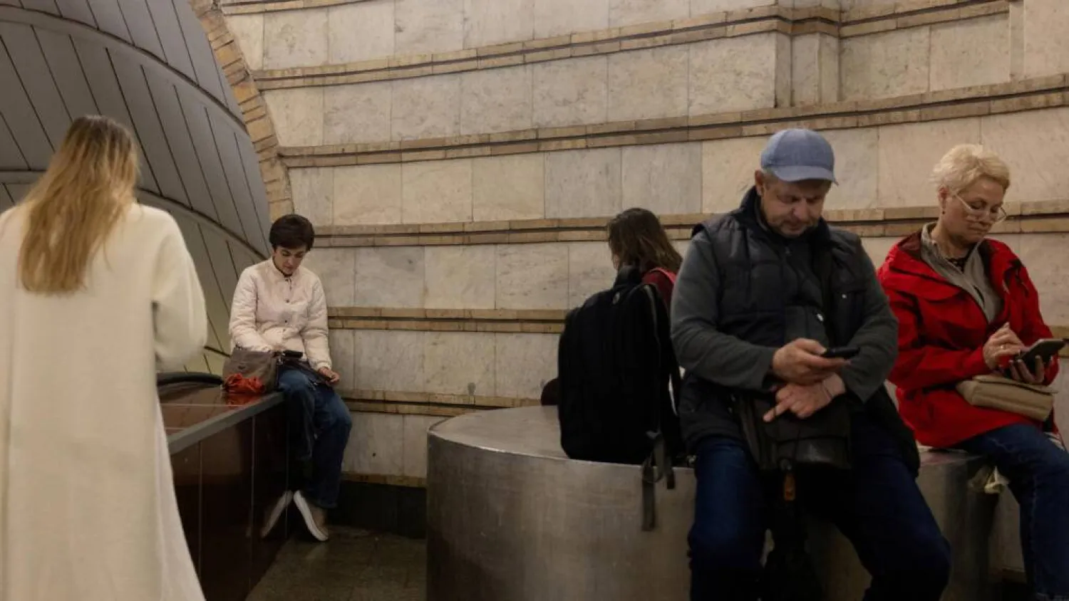 Ukrainians use Telegram channels to track incoming Russian missiles and drones. Tetiana DZHAFAROVA / AFP
