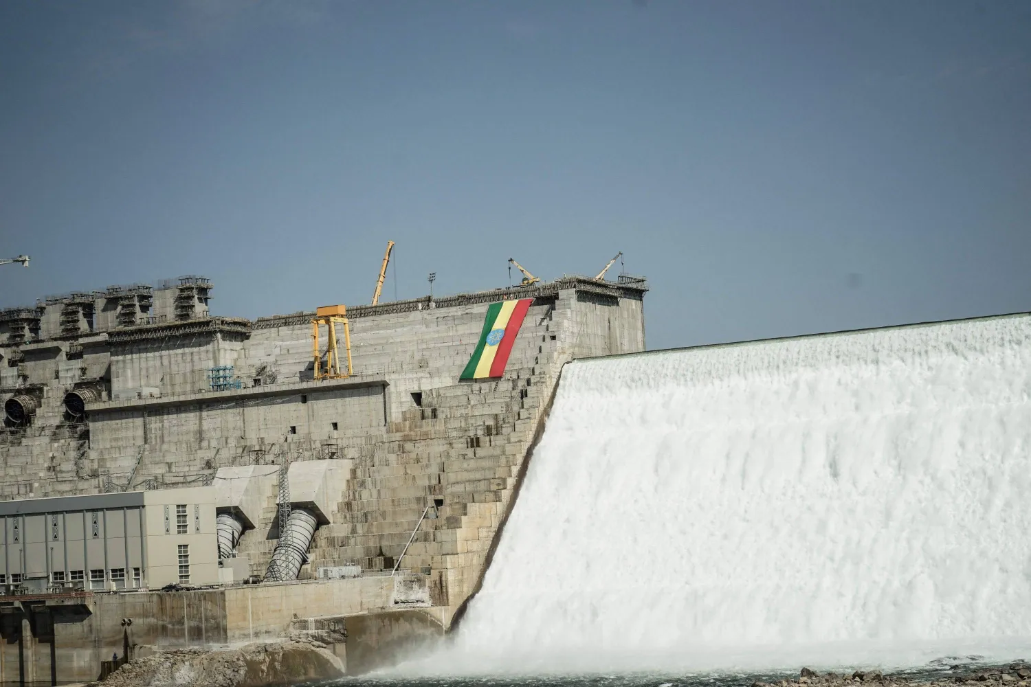 The Ethiopian national flag is seen at the Grand Ethiopian Renaissance Dam (GERD) in Guba, Ethiopia, Feb. 19, 2022. (AFP)