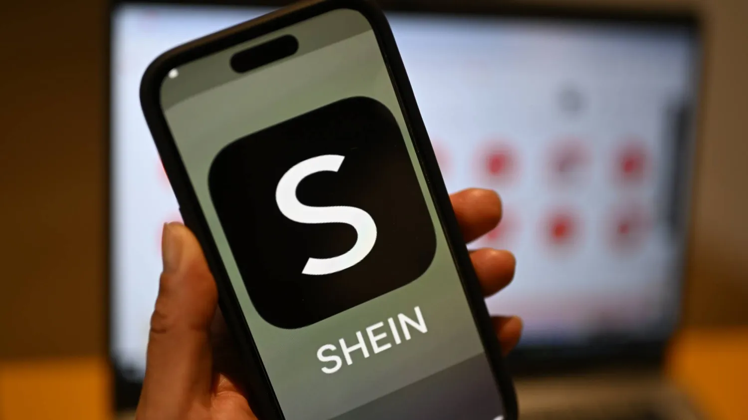 FILED - 29 April 2024, Berlin: FILE PHOTO - The Shein logo can be seen on a smartphone. Photo: Monika Skolimowska/dpa