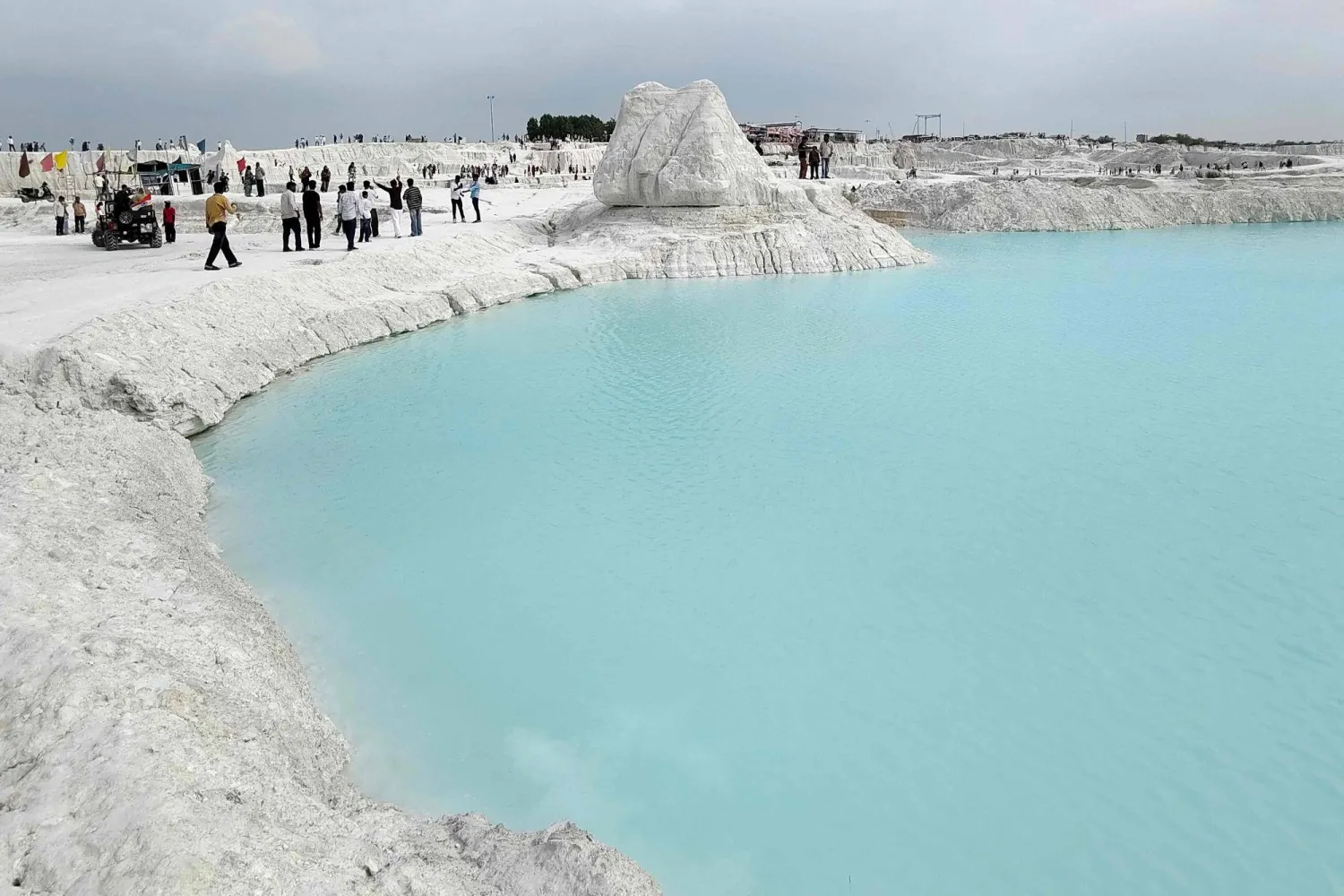 Tourists visit the marble-waste dumping yard in Rajasthan's Kishangarh city on August 16, 2026. (AFP)