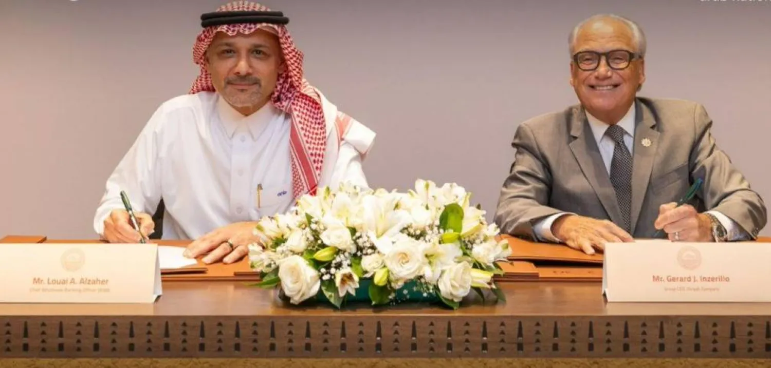 أثناء مراسم توقيع الاتفاقية (البنك العربي الوطني)