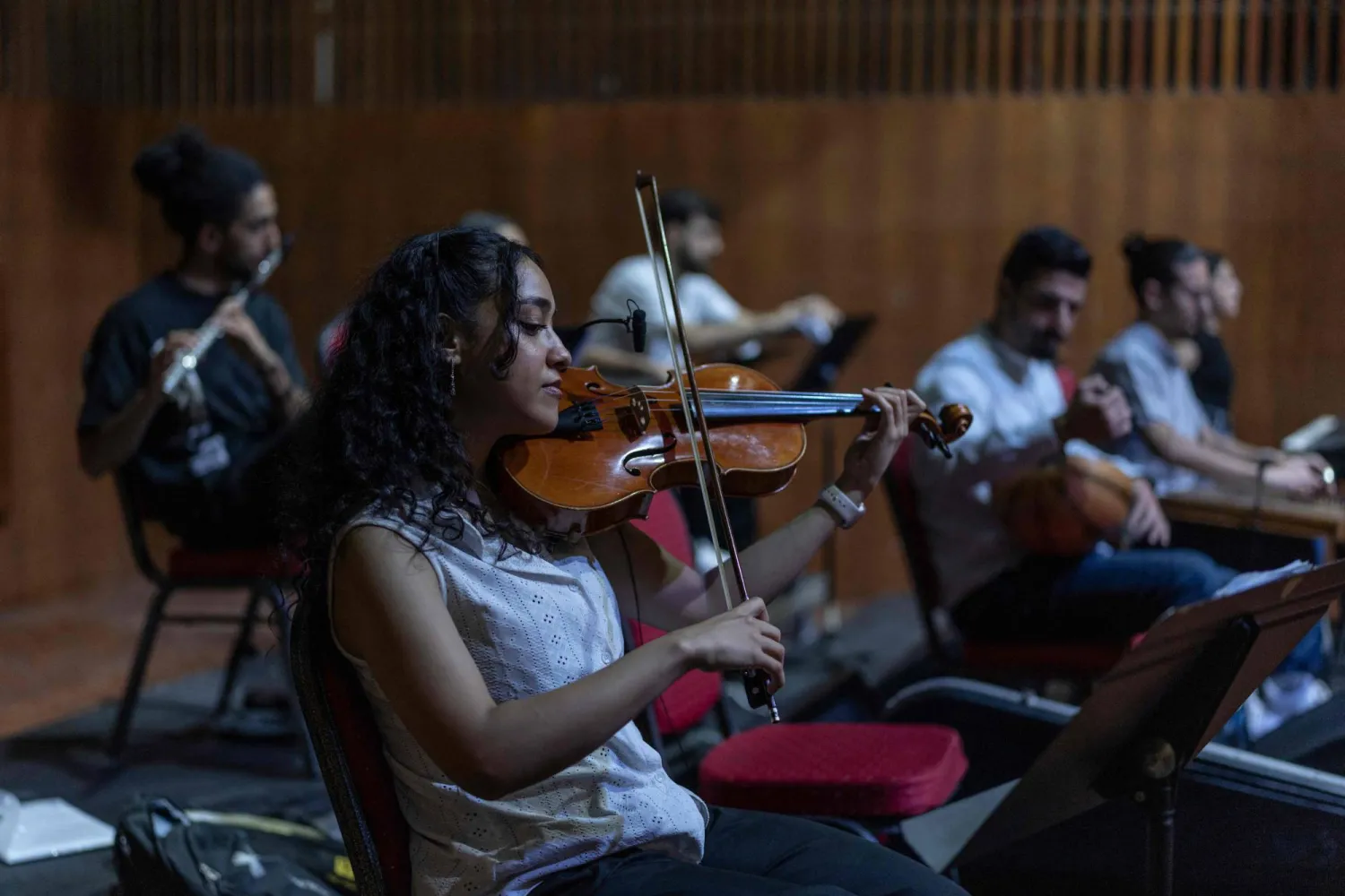 Palestinian musicians take part in a final rehearsal before the opening of the Jerusalem Festival, held at the Yabous Cultural Center after a two-year hiatus, in East Jerusalem on August 16, 2026. (AFP)