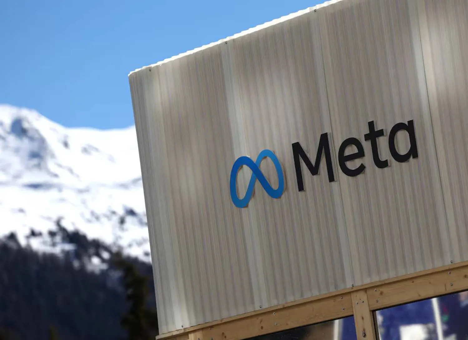 The Meta company logo at the entrance of its temporary pavilion before the World Economic Forum in Davos, Switzerland, January 18, 2025 (Reuters)