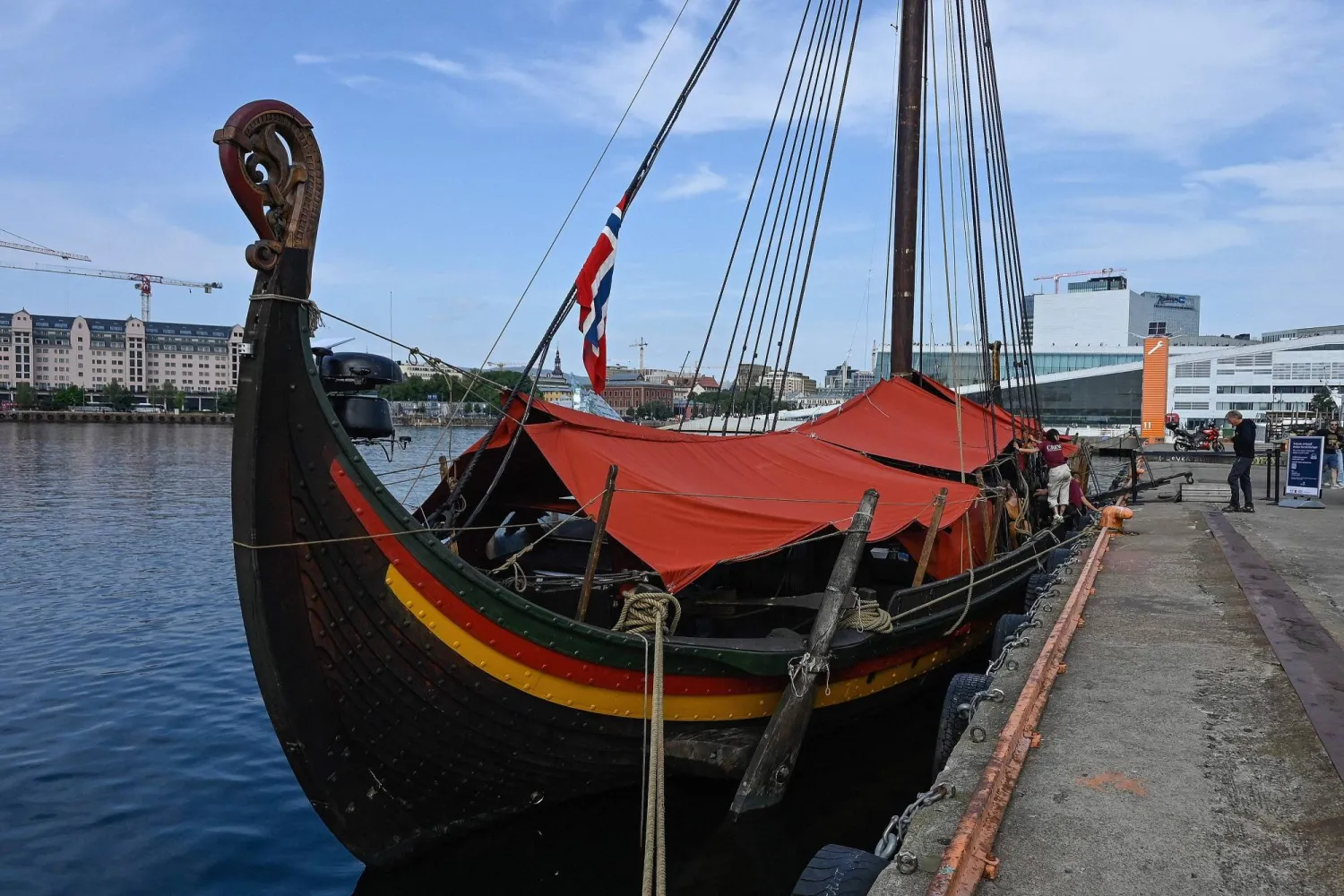 The Draken Harald Harfagre, the ship used in the movie "The Odyssey", is docked outside Oslo Opera in the Norwegian capital on August 14, 2026. (AFP)