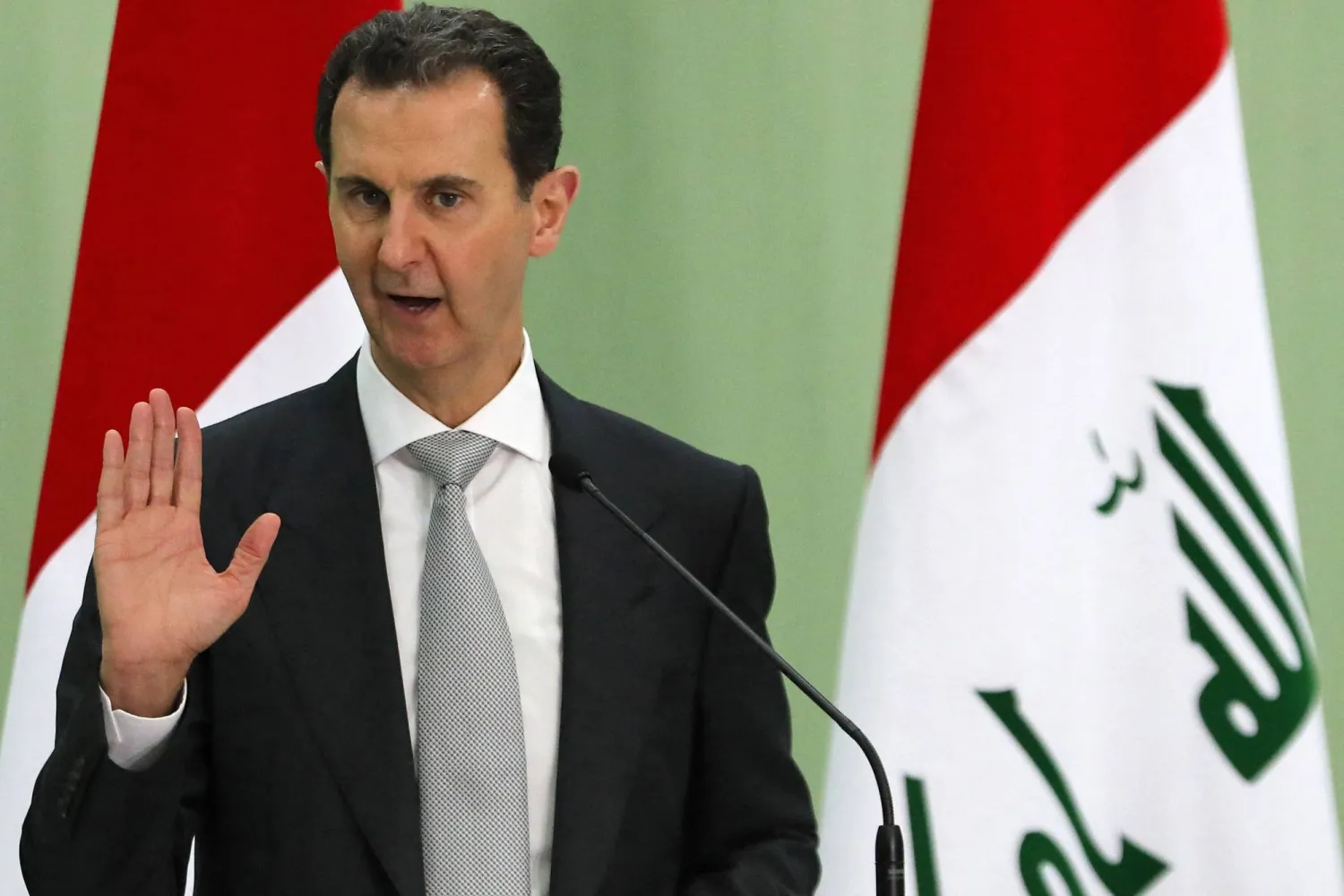 (FILES) Syria's President Bashar al-Assad speaks during a press conference with Iraq's Prime Minister in Damascus on July 16, 2023. (Photo by LOUAI BESHARA / AFP)