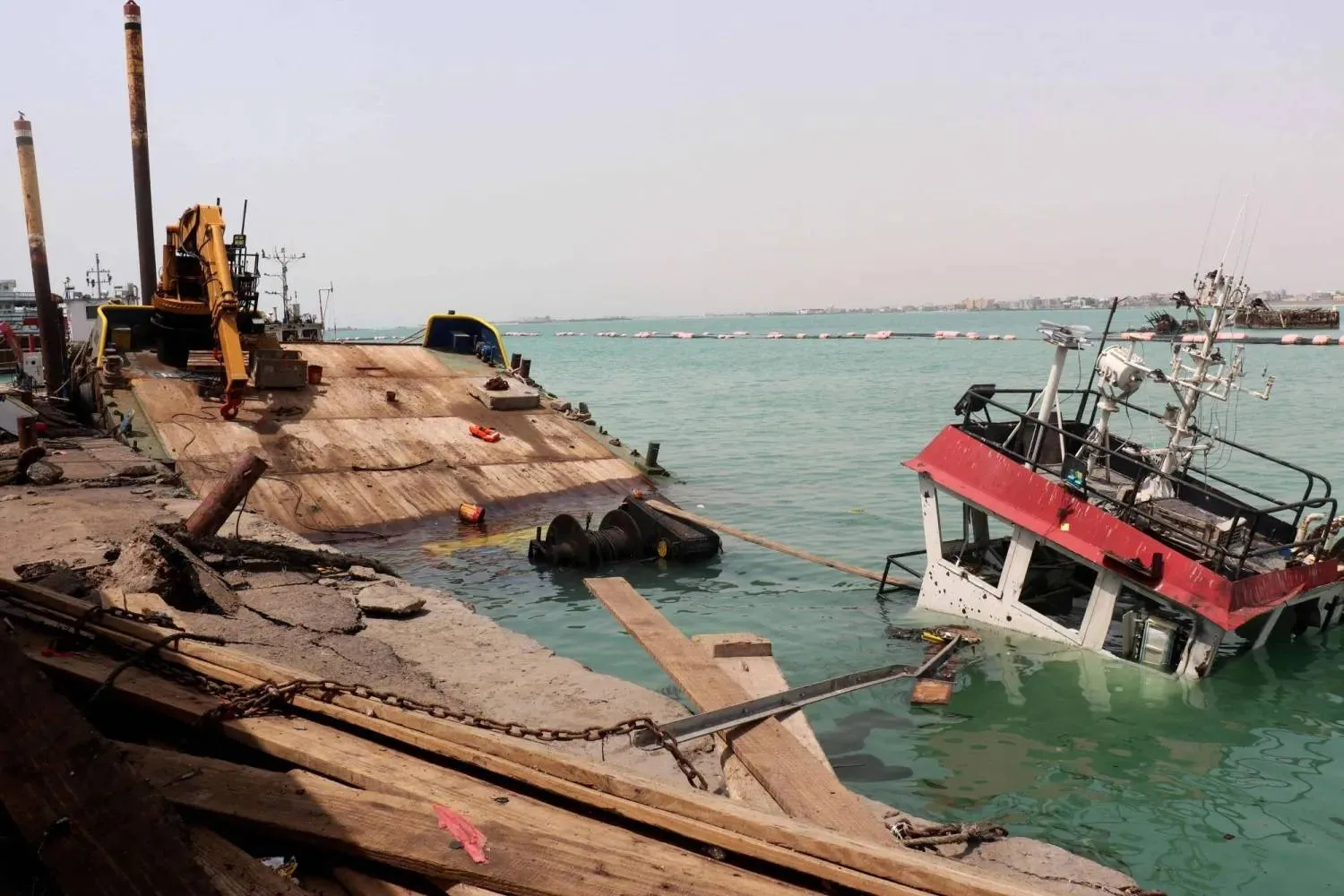 Dozens of Houthi missiles and drones targeted Yemen’s Mokha port (AFP)