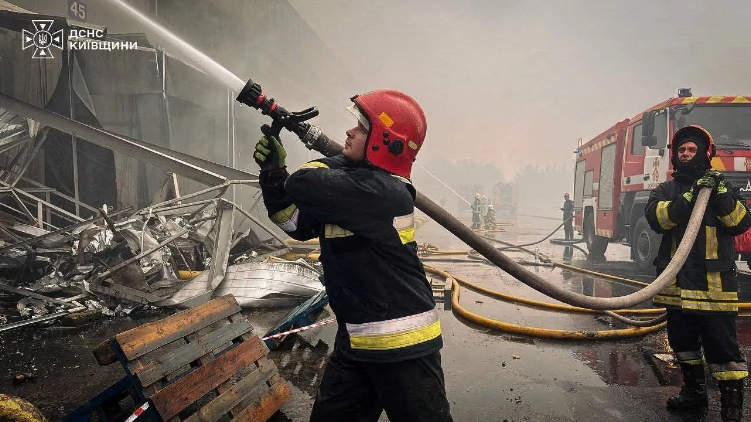 Firefighters work at a site of a Russian drone attack, amid Russia's attack on Ukraine, in the Kyiv region, Ukraine, in this handout picture released August 18, 2026. Press service of the State Emergency Service of Ukraine in Kyiv region/Handout via REUTERS 