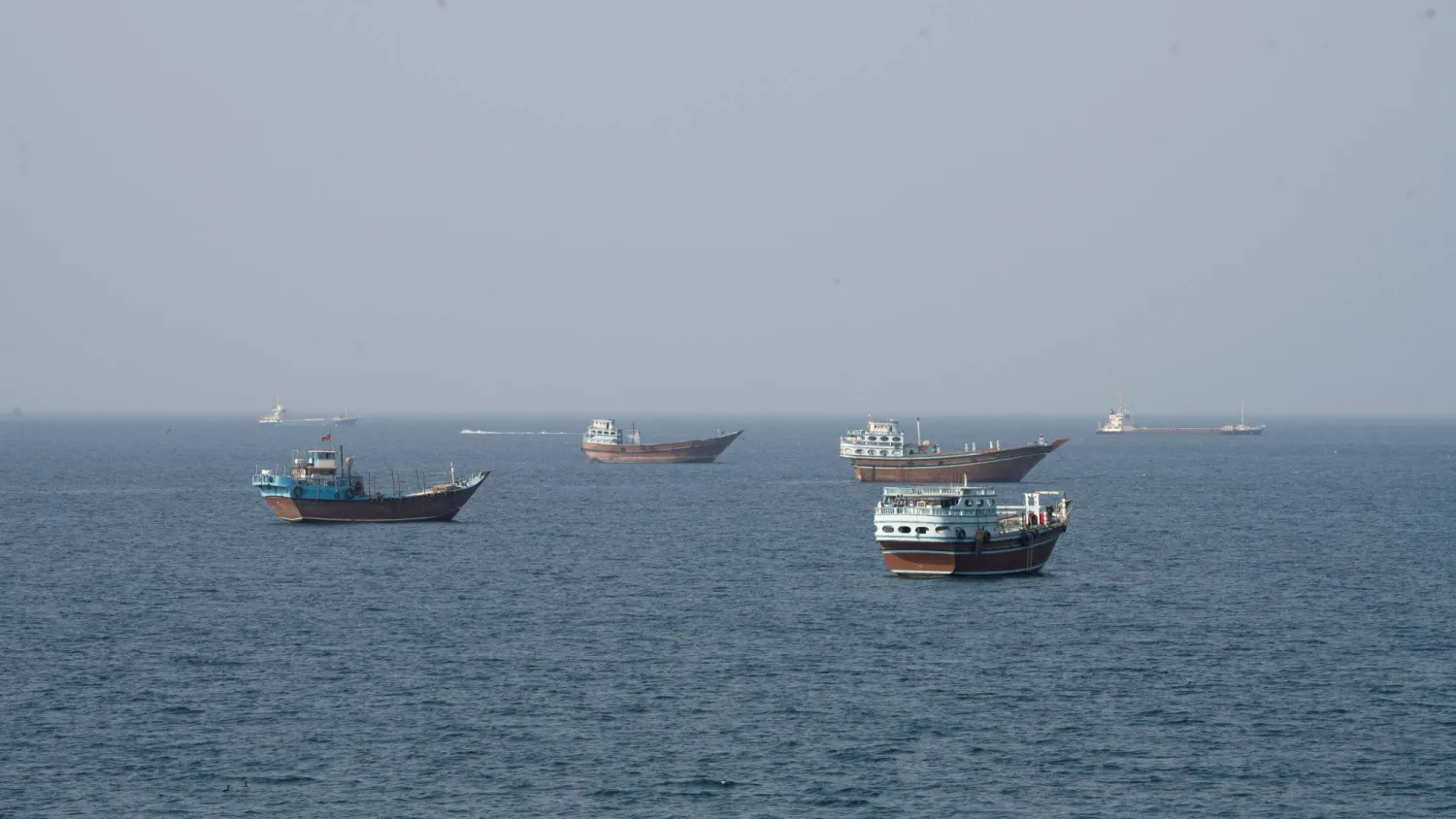 Vessels near the Strait of Hormuz, as seen from Musandam, Oman, August 17, 2026. REUTERS/Stringer