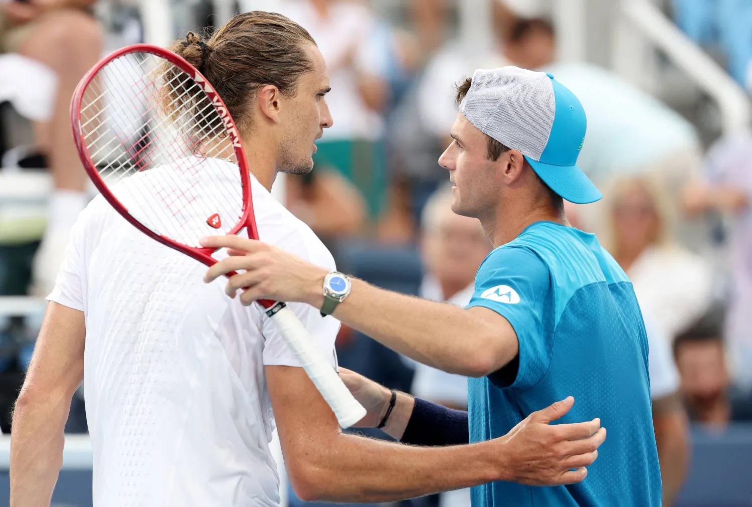 MASON, OHIO - AUGUST 19: Tommy Paul of the United States hugs Alexander Zverev of Germany after a match on day nine of the Cincinnati Open at Lindner Family Tennis Center on August 19, 2026 in Mason, Ohio. Emilee Chinn/Getty Images/AFP