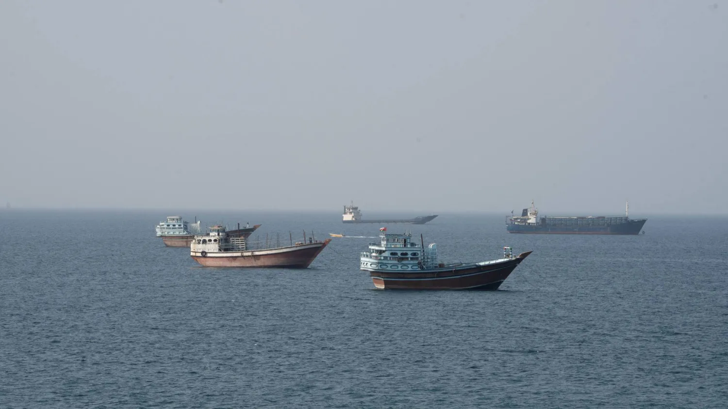Vessels near the Strait of Hormuz, as seen from Musandam, Oman, August 17, 2026. REUTERS/Stringer