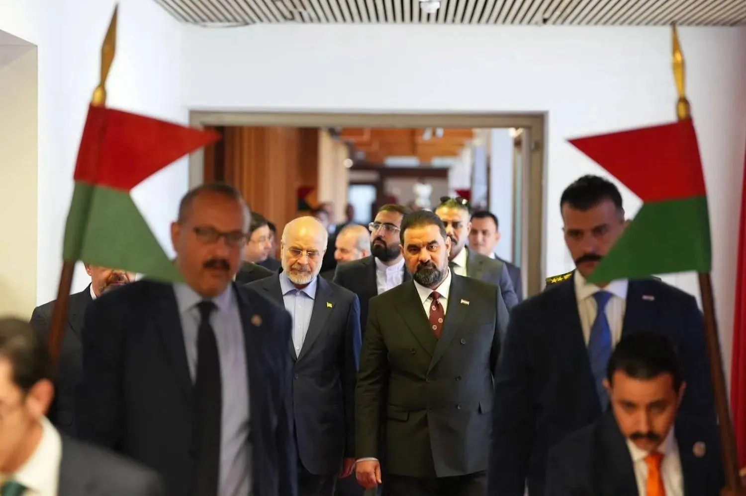 Iraqi Parliament Speaker Haibat al-Halbousi with Iranian Parliament Speaker Mohammad Bagher Ghalibaf at the entrance to parliament (parliament website)