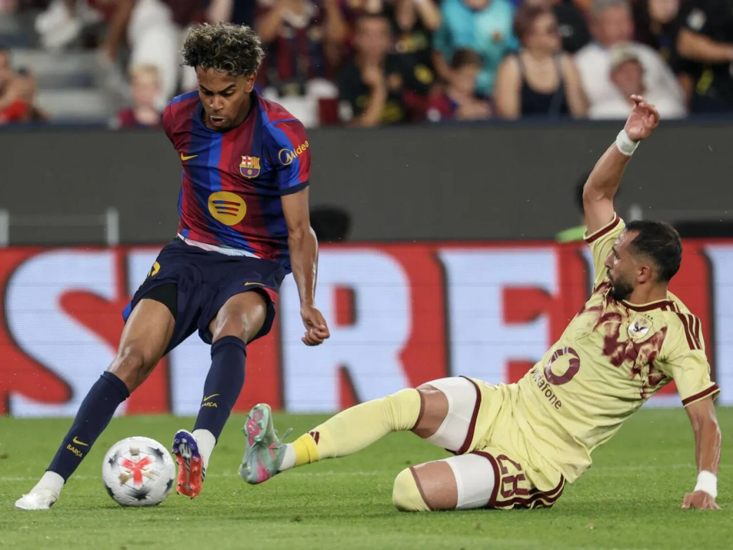 Barcelona's Spanish forward Lamine Yamal will lead a new-look attacking line for the champions. Lluis GENE / AFP

