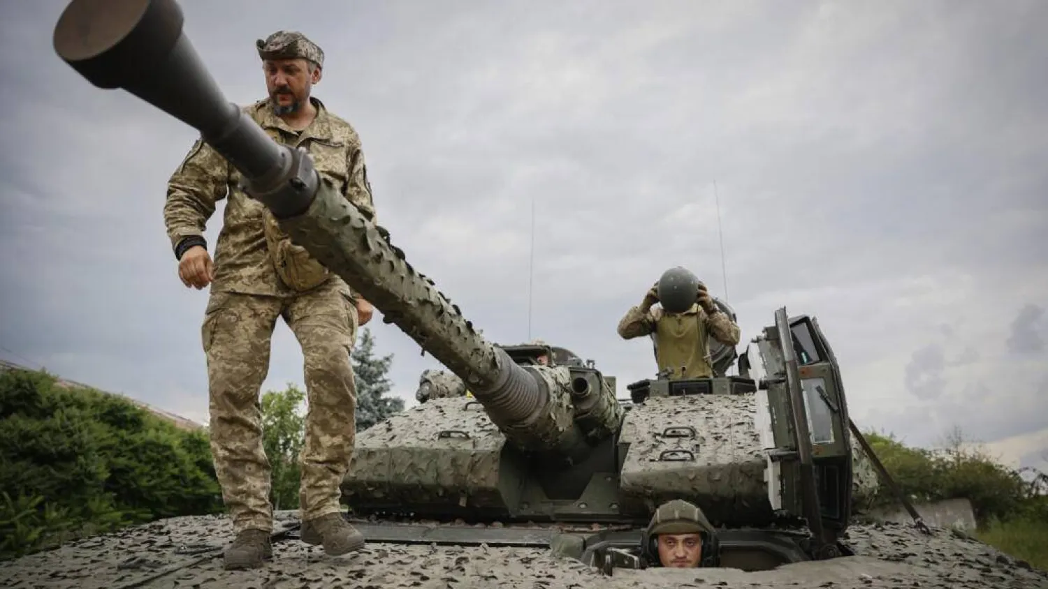 Ukrainian soldiers on a Swedish CV90 infantry fighting vehicle at their positions near Bakhmut, Donetsk region, Ukraine, Sunday, June 25, 2023. Roman Chop, AP
