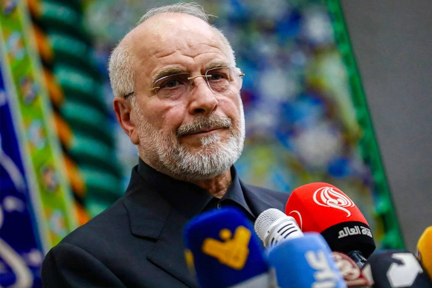 رئيس البرلمان الإيراني محمد باقر قاليباف خلال مؤتمر صحافي في كربلاء بالعراق... 20 أغسطس 2026 (أ.ف.ب)