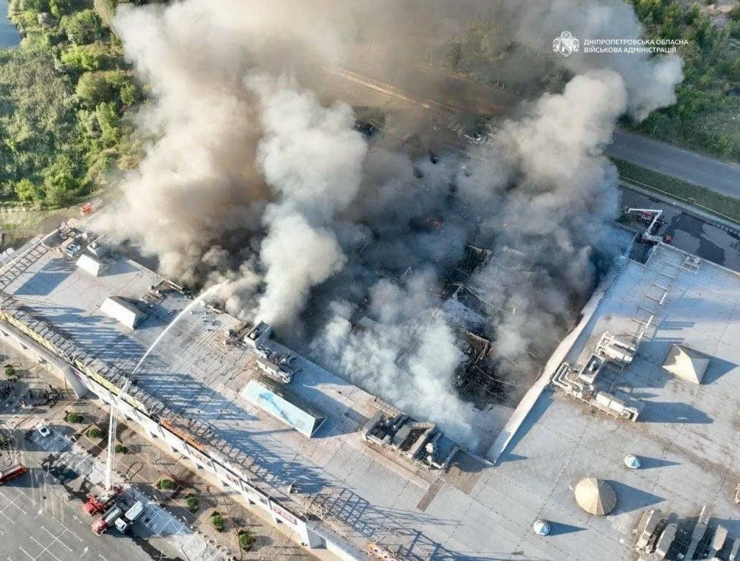 Firefighters work at the site of a shopping mall hit by Russian drone strikes in Kryvyi Rih, amid Russia's attack on Ukraine, in Dnipropetrovsk region, Ukraine August 21, 2026. Head of the Dnipropetrovsk Regional Military Administration Oleksandr Hanzha via Telegram/Handout via REUTERS