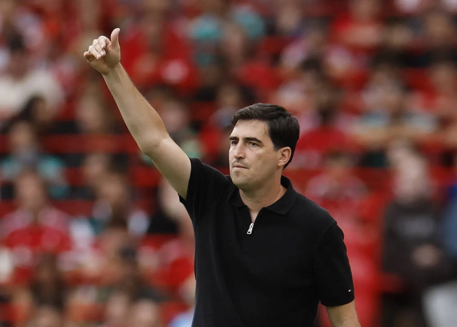 Football - Pre-Season Friendly - Liverpool v Como - Anfield, Liverpool, Britain - August 16, 2026 Liverpool coach Andoni Iraola gives instructions to his players during the match. (Reuters)