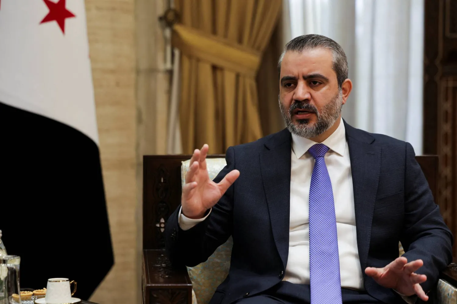 وزير الخارجية السوري أسعد الشيباني في دمشق (رويترز)