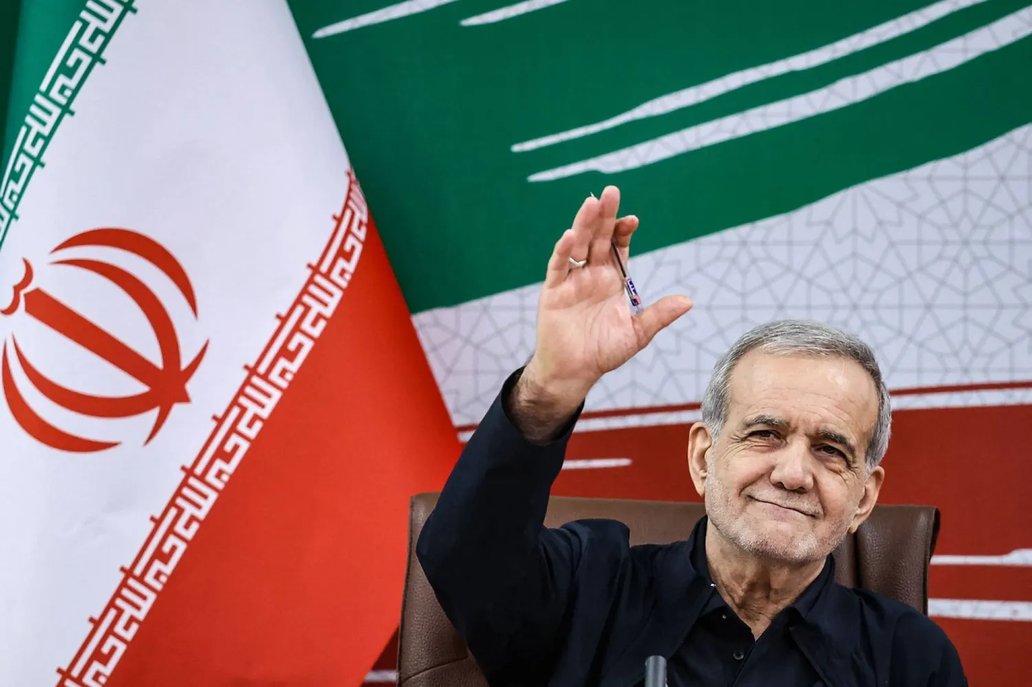 A handout photo made available by the Iranian Presidential Office shows Iran's President Masoud Pezeshkian attending a press conference in the capital Tehran, on August 8, 2026. (Photo by Iranian Presidential Office / AFP) / 