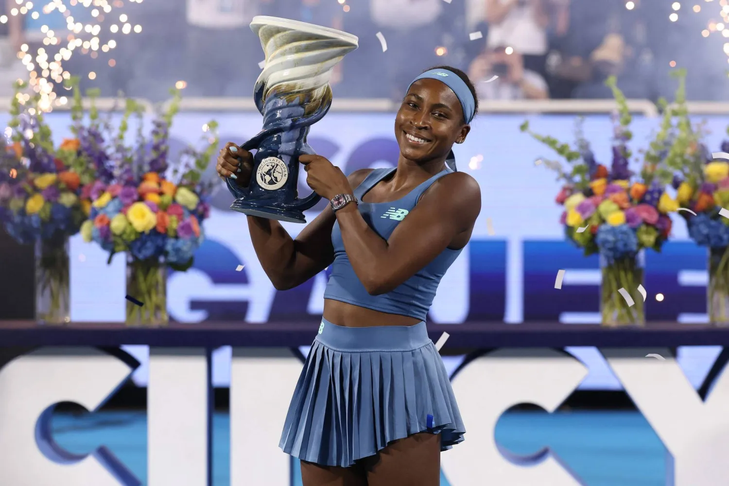 MASON, OHIO - AUGUST 23: Coco Gauff of the United States celebrates with the Rookwood Cup after defeating Jessica Pegula of the United Staes during the Women's Final on day twelve of the Cincinnati Open at the Lindner Family Tennis Center on August 23, 2026 in Mason, Ohio.   Matthew Stockman/Getty Images/AFP