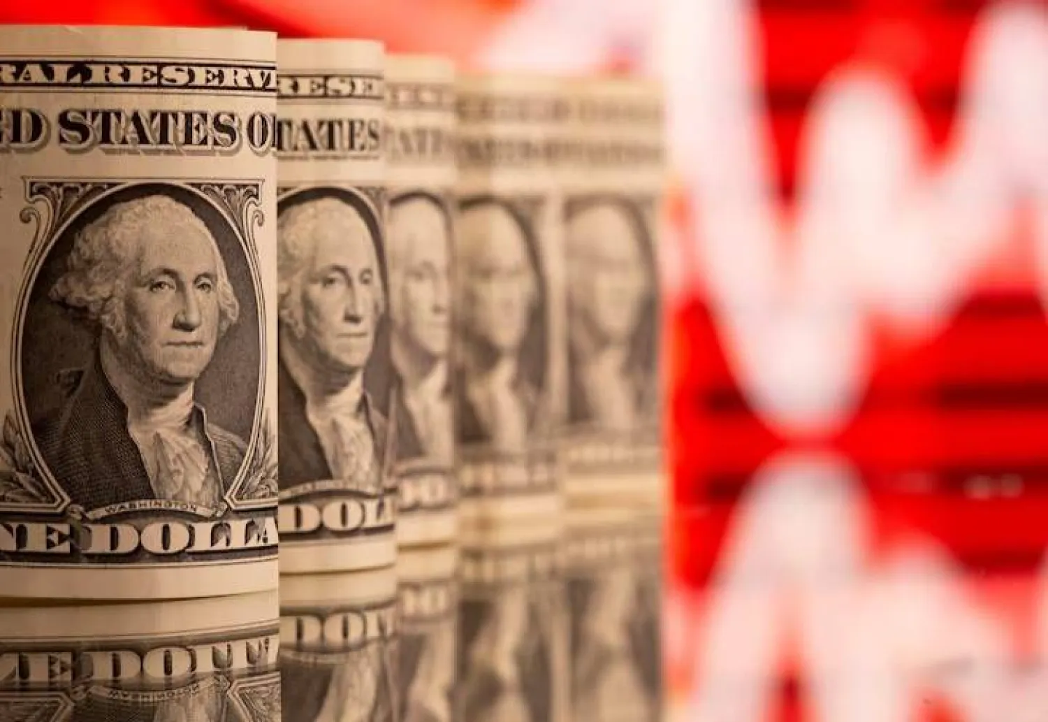 أوراق نقدية من فئة الدولارات (رويترز)