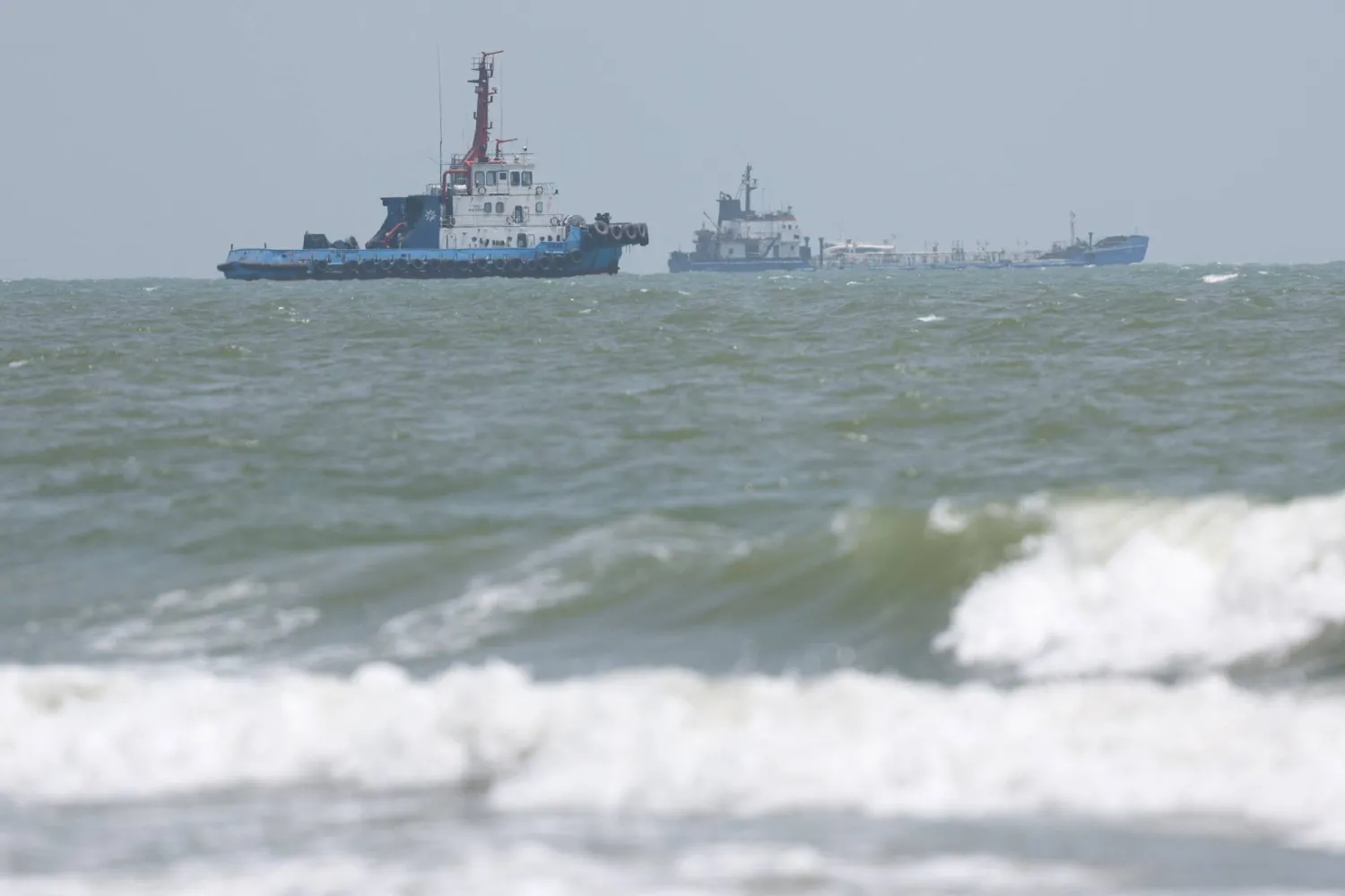 Vessels in the Strait of Hormuz are visible near the beach of Bandar Abbas, Iran, August 25, 2026. Majid Asgaripour/WANA (West Asia News Agency) via REUTERS